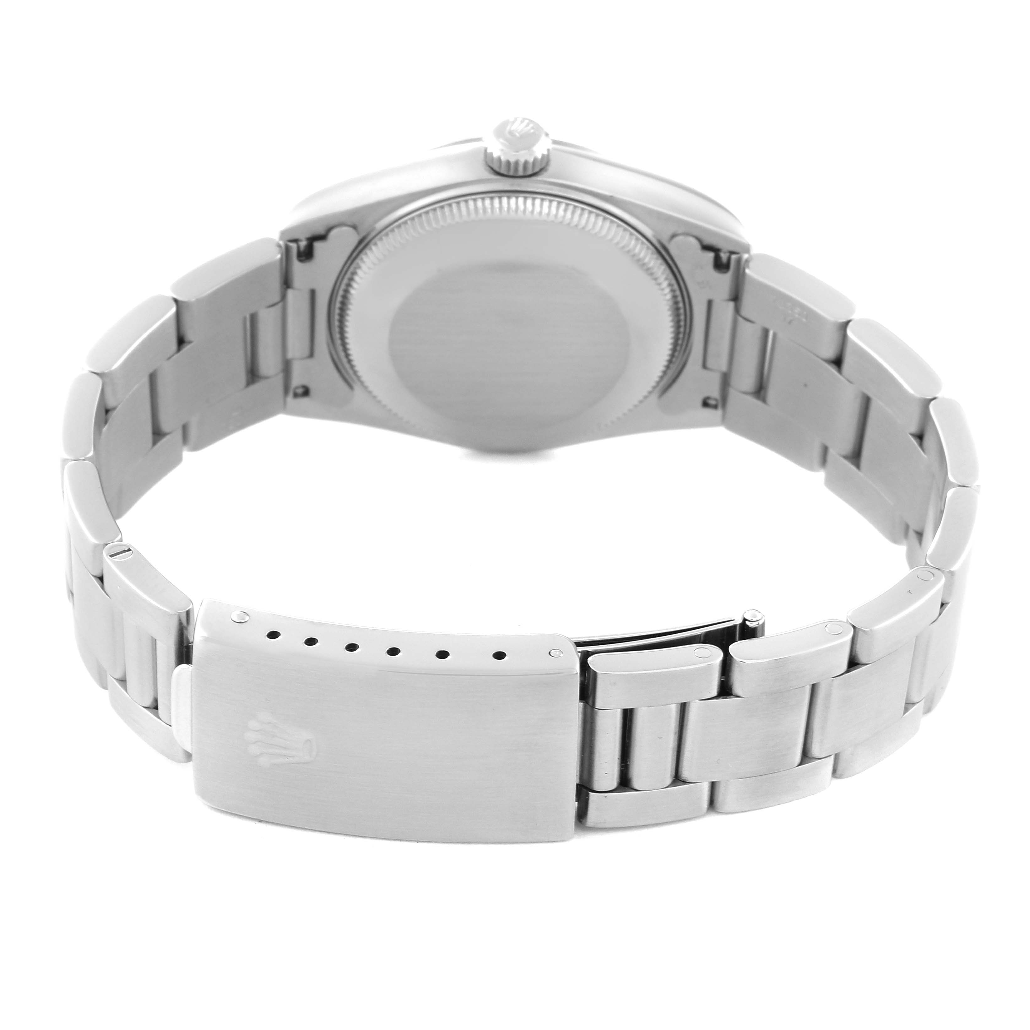 The image shows the back view of a Mid-Size Rolex watch, highlighting the case back and clasp.