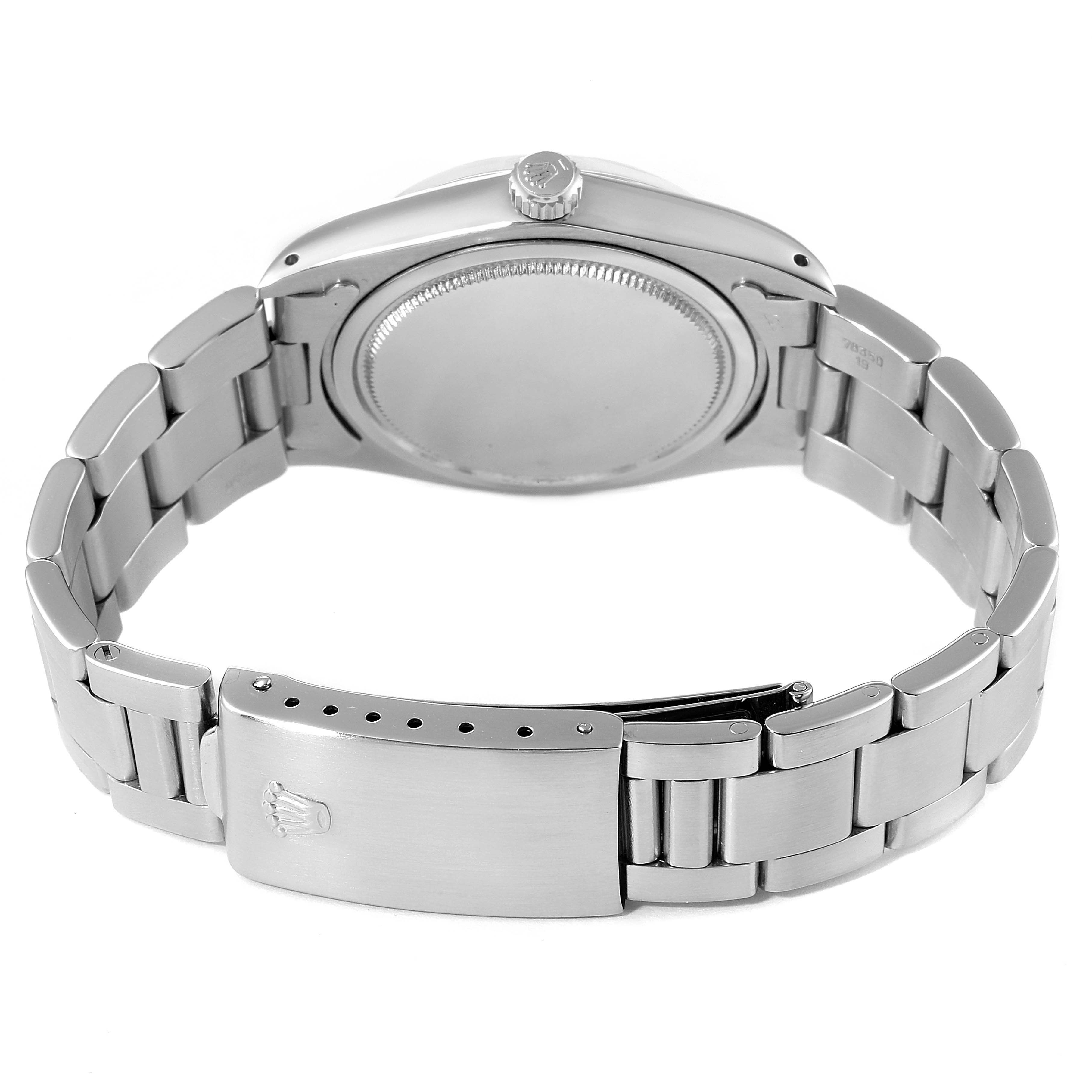 The image shows the back view of the Vintage Collection Rolex watch, focusing on the watch
s bracelet and clasp.