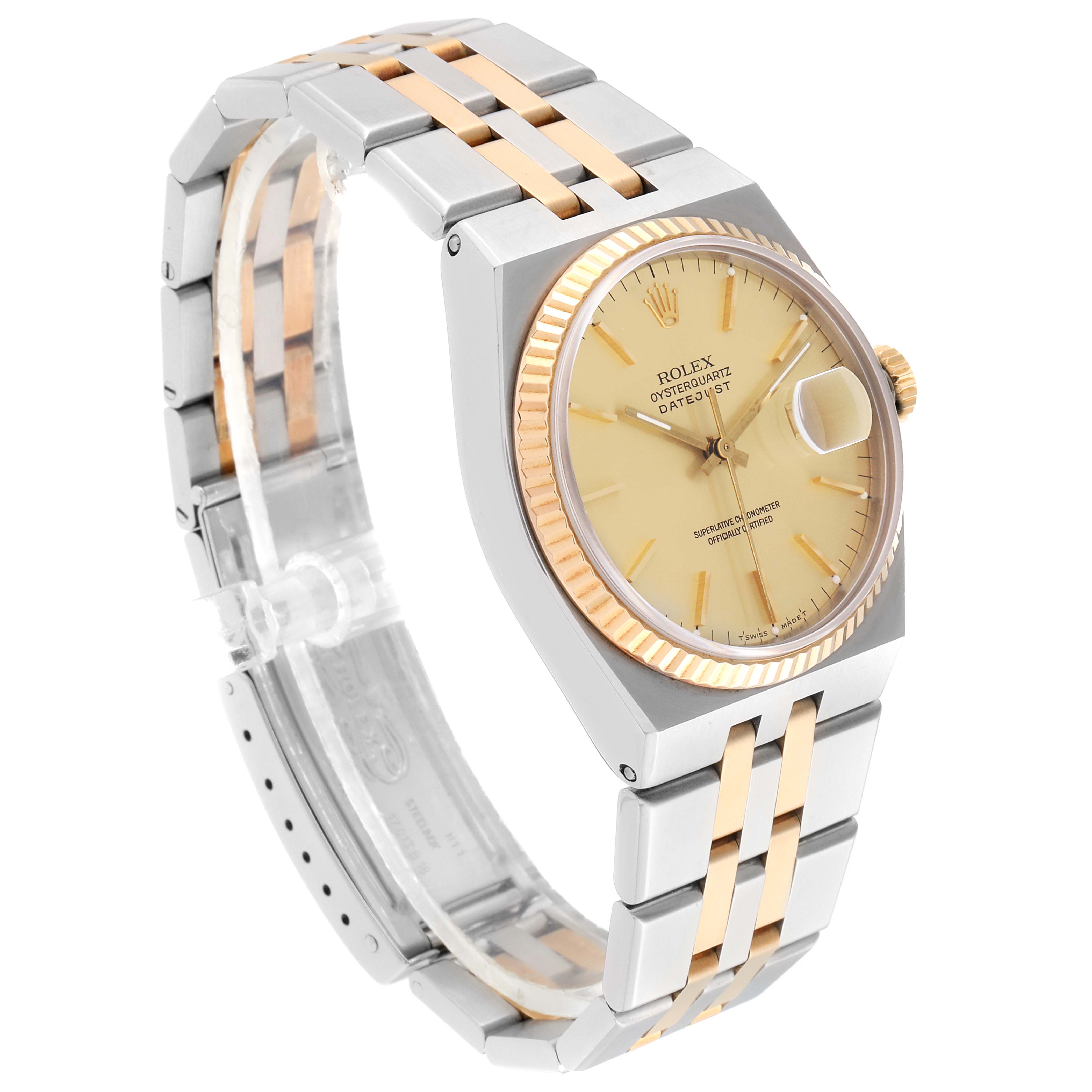 This image shows a Rolex Oysterquartz 19508 Men
s Steel and Gold (two tone) Champagne Dial 19508 Men
s Steel and Gold (two tone) Champagne Dial watch at an angle highlighting its two-tone bracelet, fluted bezel, and date window.