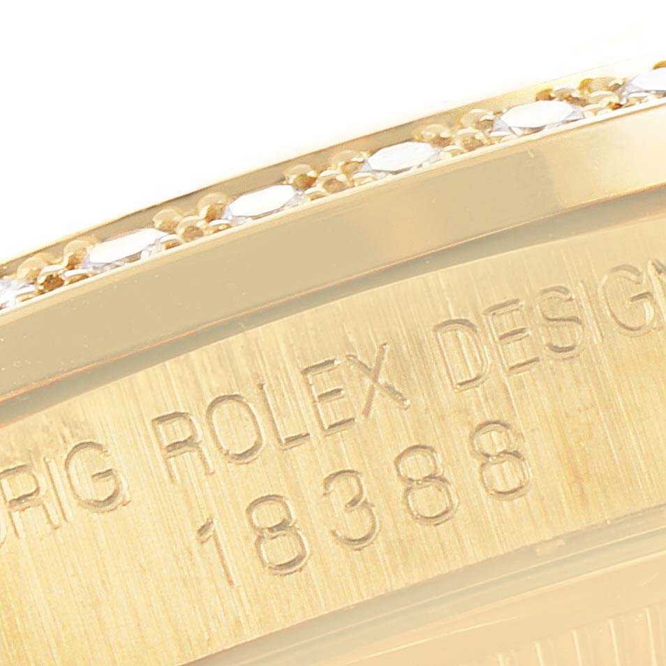 The image shows a close-up of the case
s side detailing and serial number on a Rolex President 18388 Men
s Yellow Gold Black Dial 18388 Men
s Yellow Gold Black Dial watch.