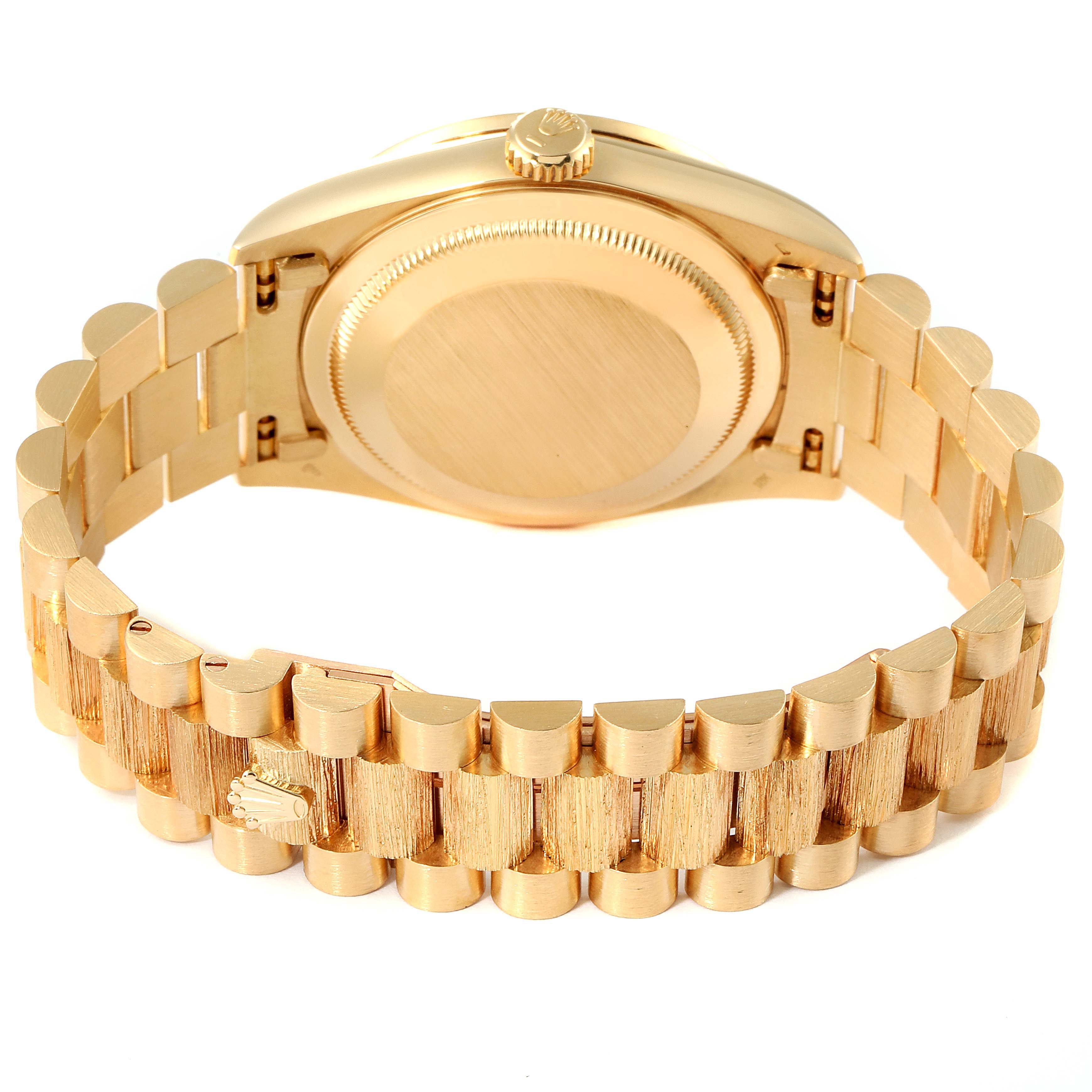 The image shows the back view of a Rolex President 18388 Men
s Yellow Gold Black Dial 18388 Men
s Yellow Gold Black Dial model watch, highlighting the bracelet and case back.