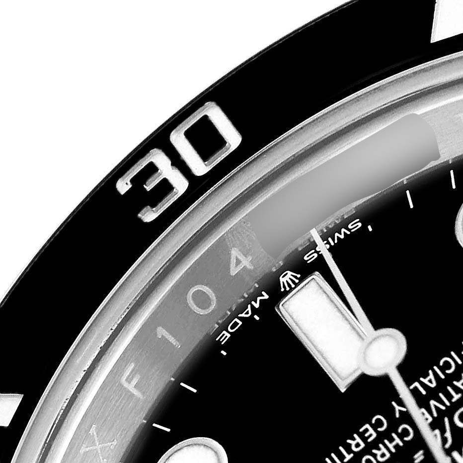The image shows a close-up of the bezel and part of the dial of a Rolex Submariner 126610 Men's Stainless Steel Black Dial, focusing on the 30-minute mark.