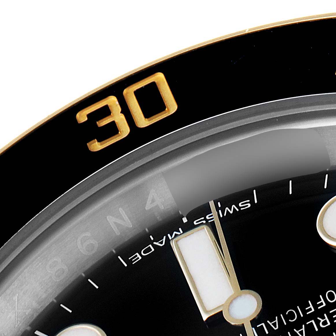The image shows a close-up angle of the bezel and part of the dial of a Rolex Submariner 116613 Men
s Steel and Gold (two tone) Black Dial 116613 Men
s Steel and Gold (two tone) Black Dial watch.
