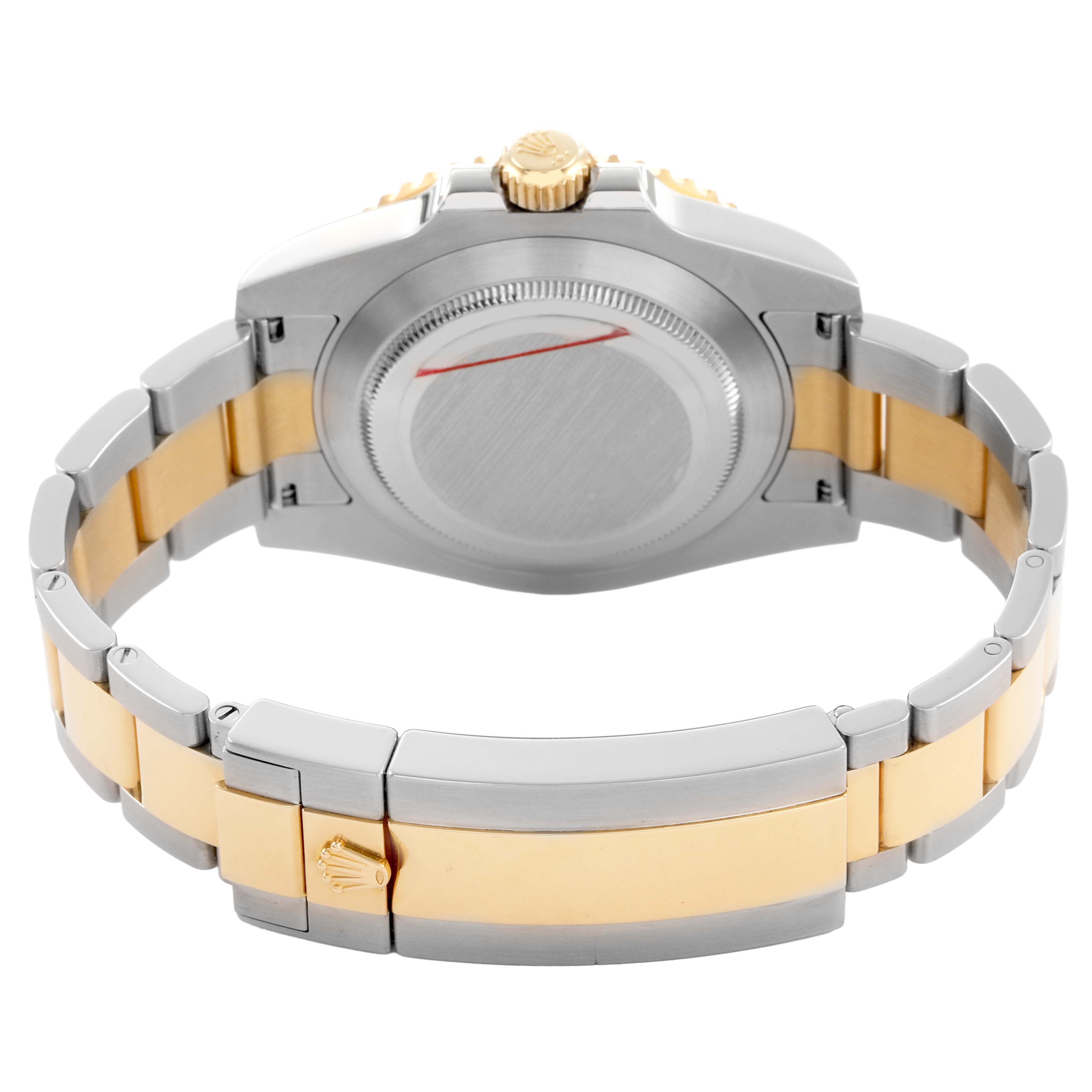 The image shows the back view of a Rolex Submariner 116613 Men's Steel and Gold (two tone) Blue Dial, highlighting the case back, crown, and two-tone bracelet.