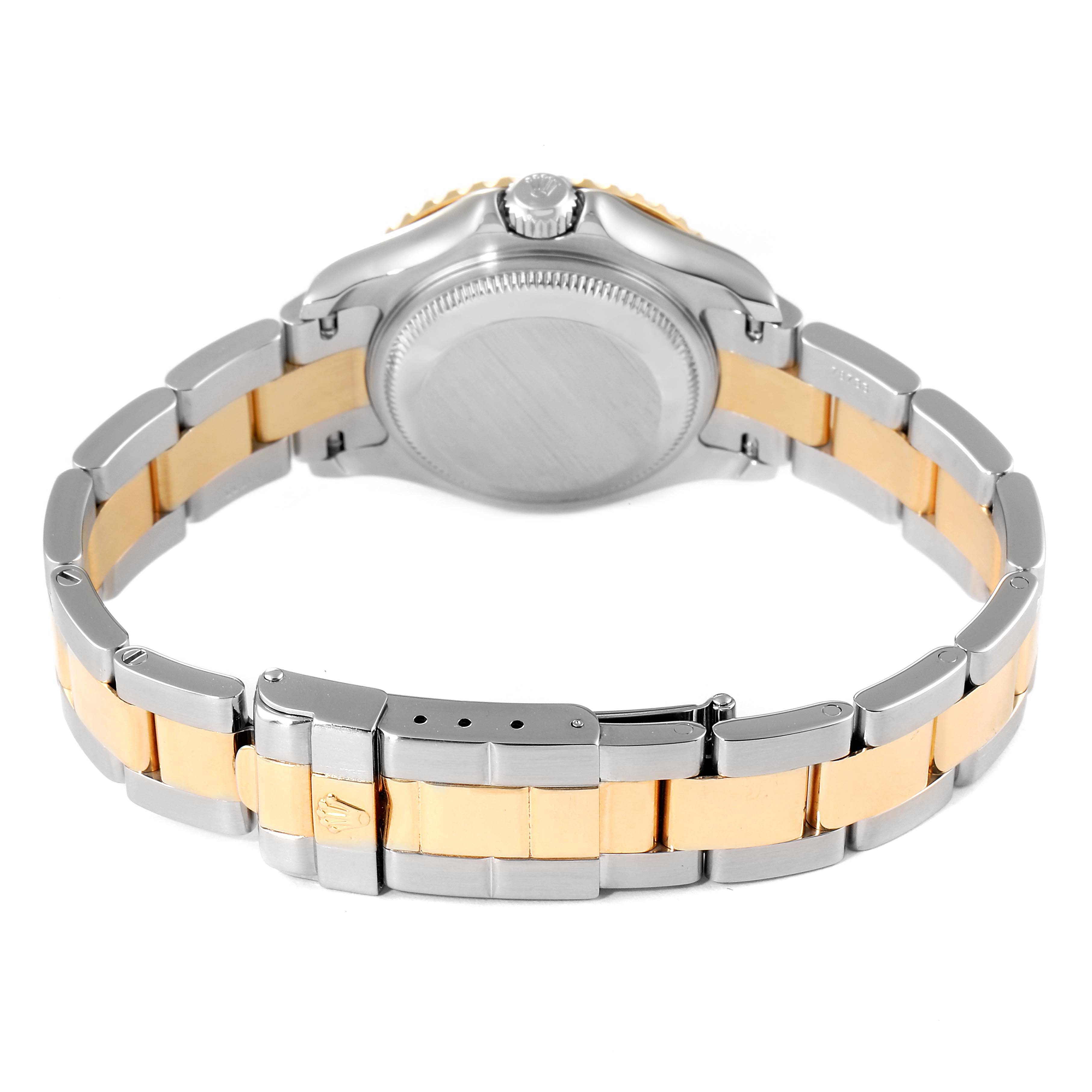 The image shows the back view of a Rolex Yacht-Master 169623 Women's Steel and Gold (two tone) White Dial 169623 Women's Steel and Gold (two tone) White Dial watch, highlighting its clasp and bracelet links.