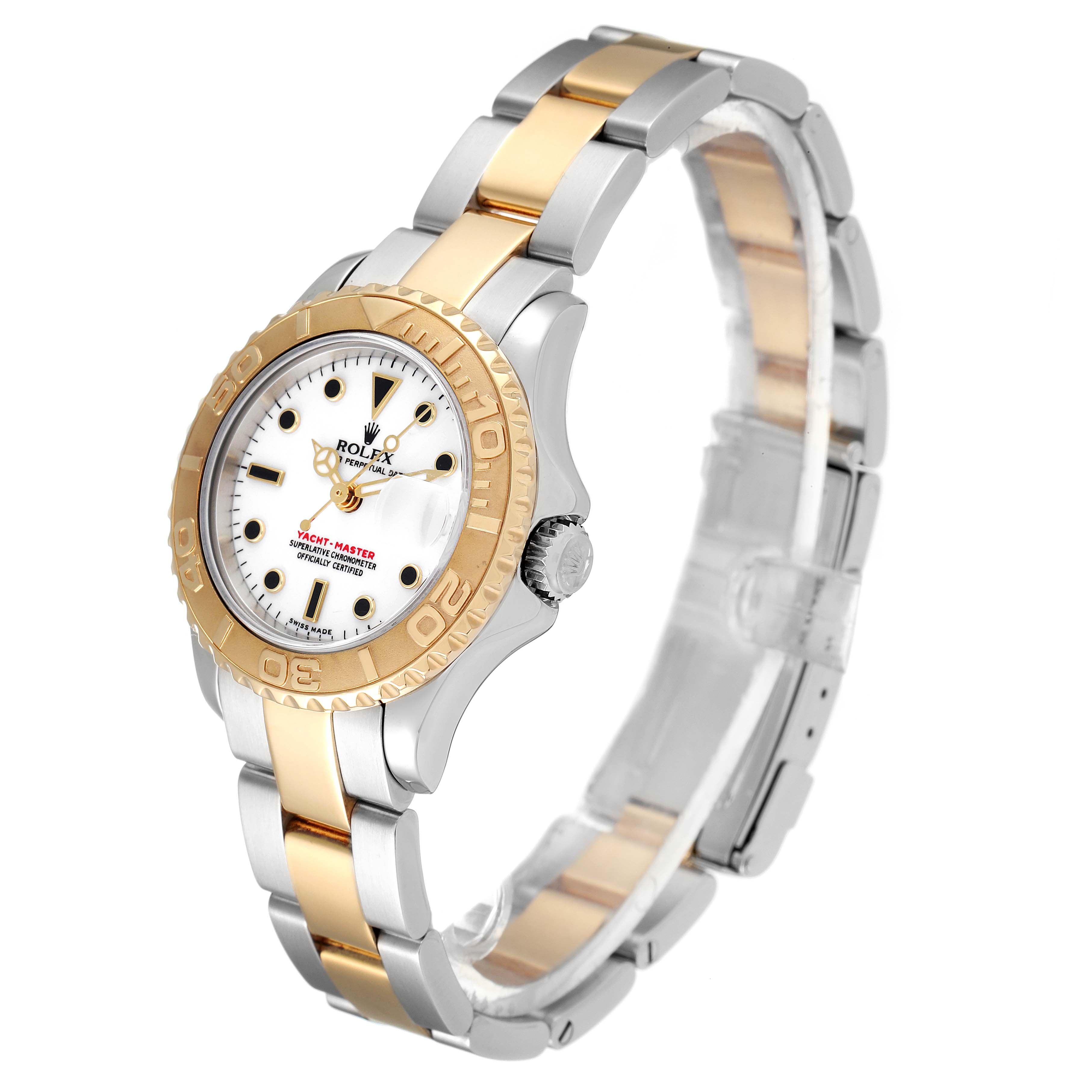 The Rolex Yacht-Master 169623 Women's Steel and Gold (two tone) White Dial 169623 Women's Steel and Gold (two tone) White Dial watch is shown at a three-quarter angle, highlighting the two-tone bracelet, bezel, and face.