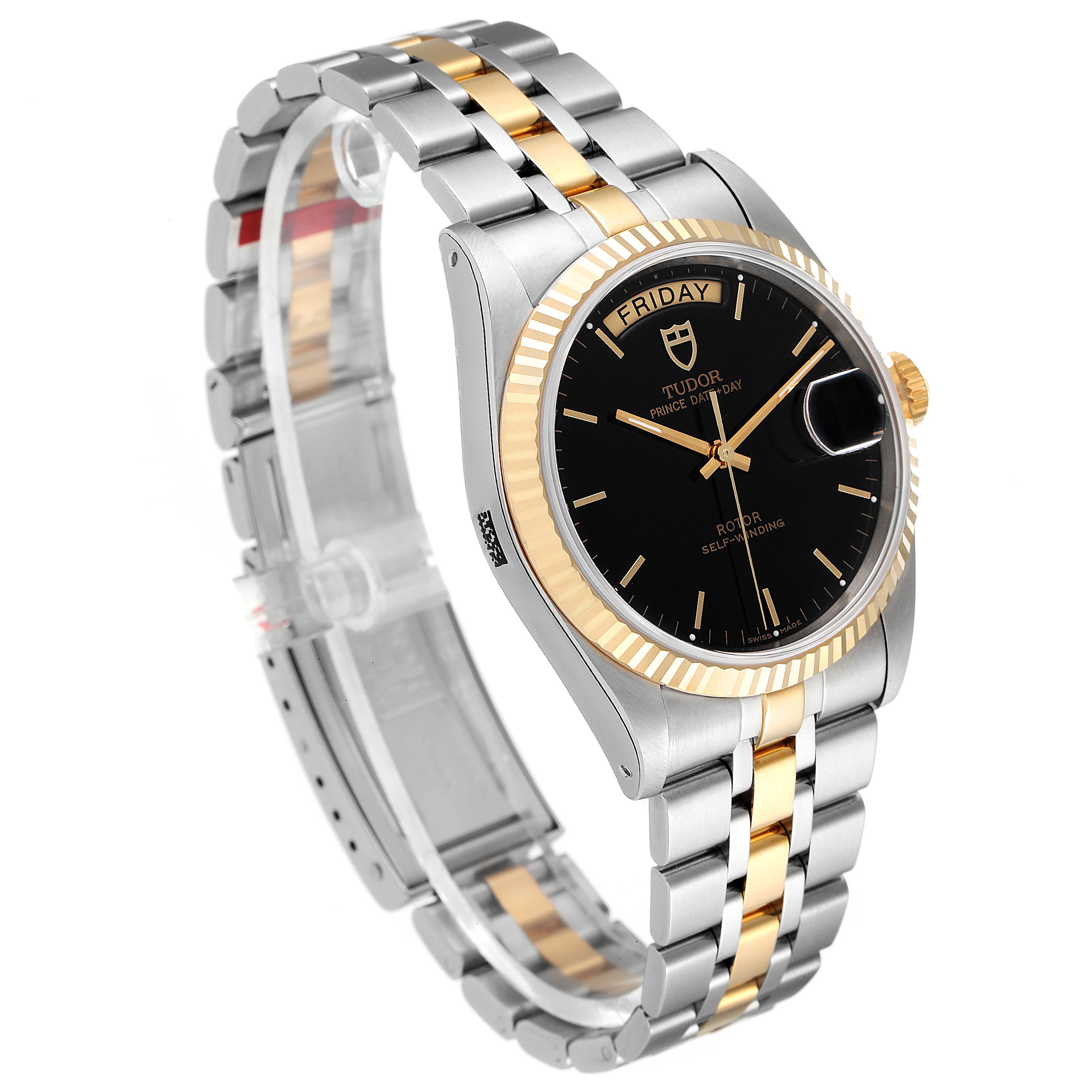 The image shows a Tudor Prince 76213 Men's Steel and Gold (two tone) Black Dial 76213 Men's Steel and Gold (two tone) Black Dial model watch with a two-tone metal band at a 3/4 angle.
