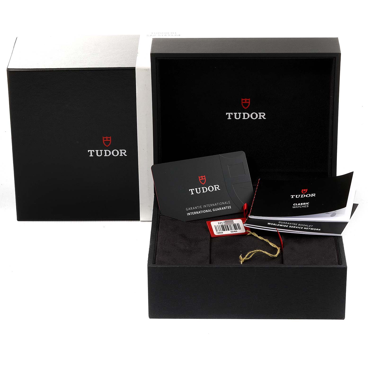 This image shows the packaging, warranty card, and booklets of a Tudor Prince 72033 Men's Steel and Gold (two tone) Champagne Dial 72033 Men's Steel and Gold (two tone) Champagne Dial model watch.