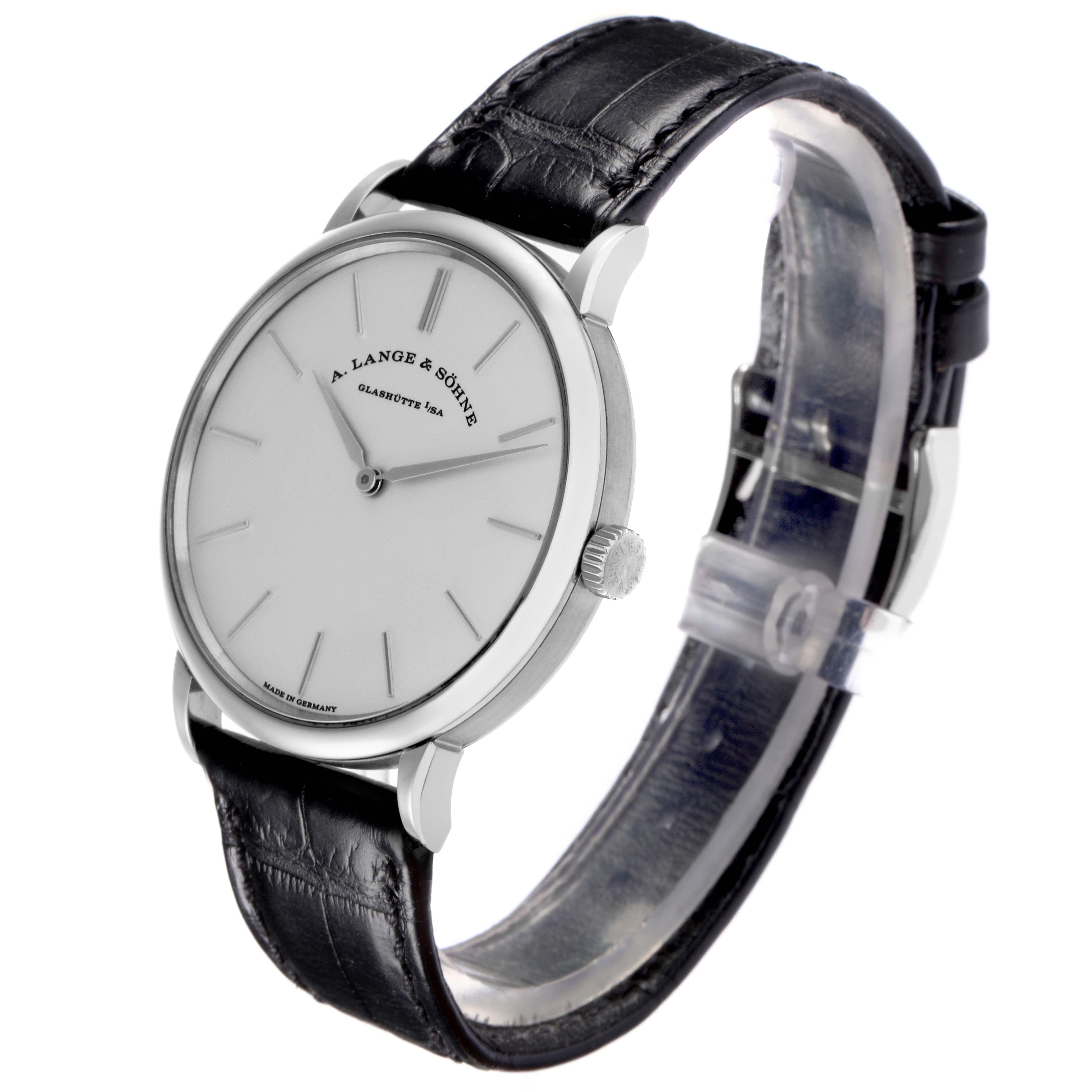 The A. Lange & Söhne Saxonia model 201.027 men's watch is shown at a three-quarter angle, highlighting the face, case, crown, and black leather strap.