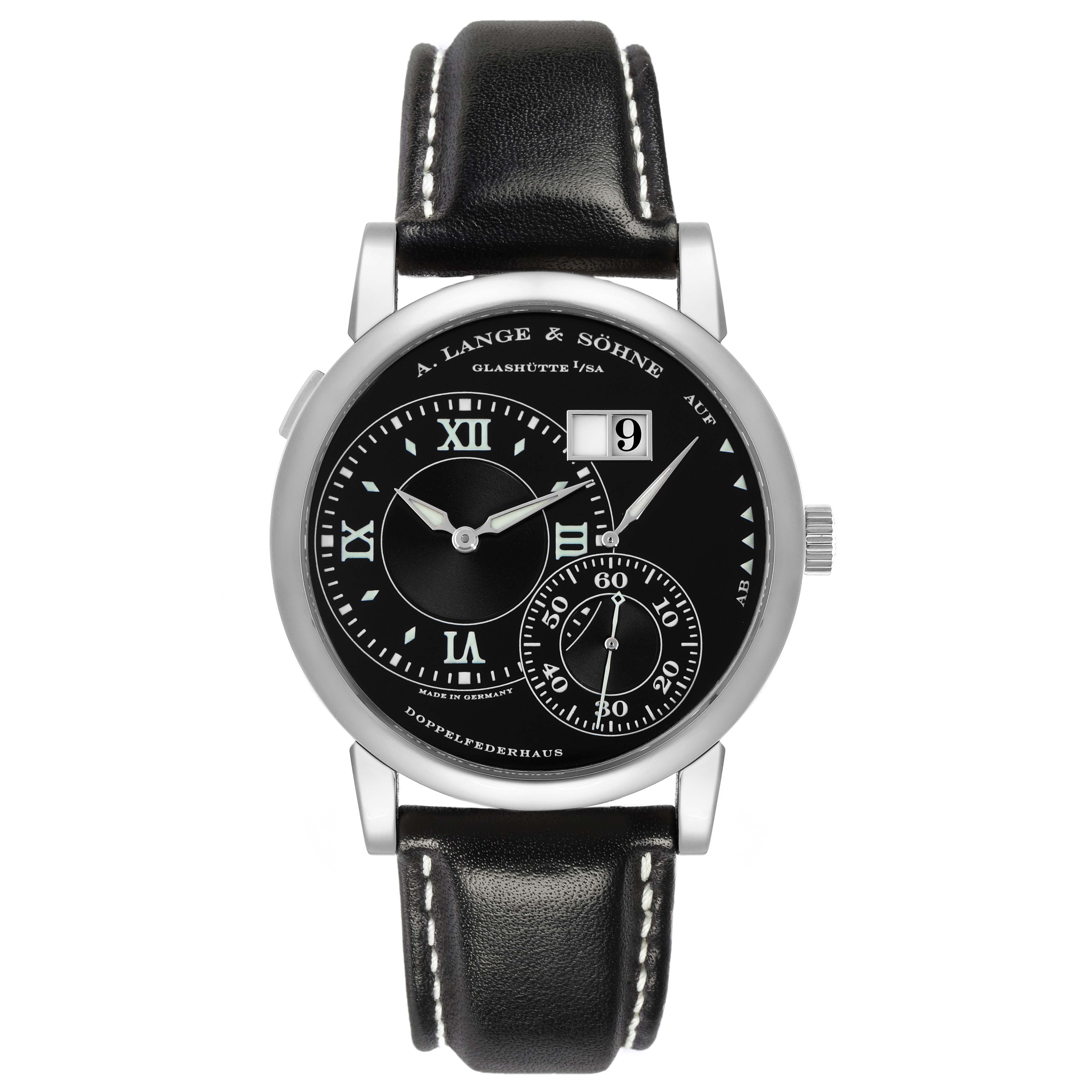 The A. Lange & Söhne Lange 1 Model 115.029 men's watch is shown from the front, displaying its black dial, subdials, date window, and black leather strap.
