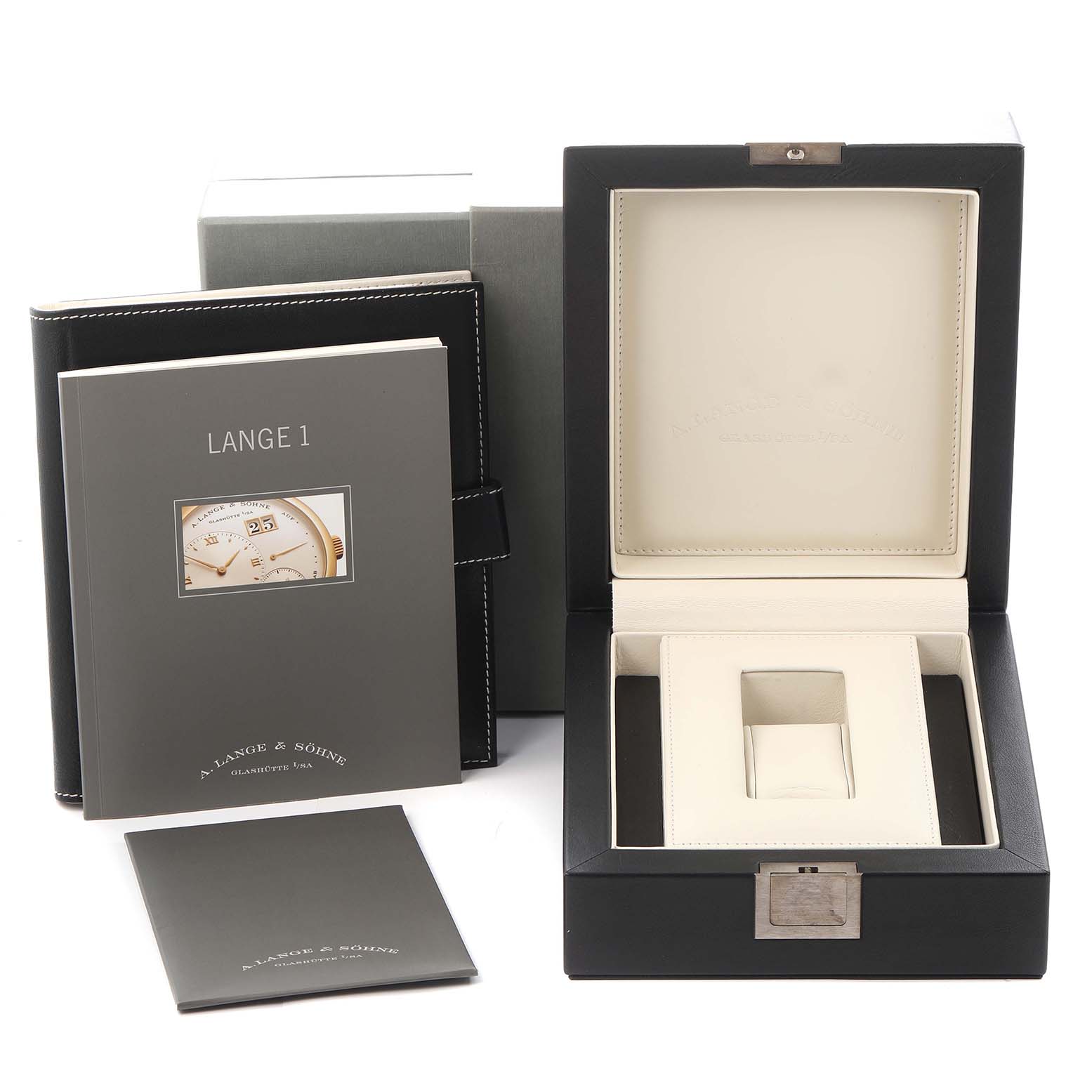 The image shows the packaging and accessories for an A. Lange & Söhne Lange 1, model 115.029, including the open watch box and manuals.