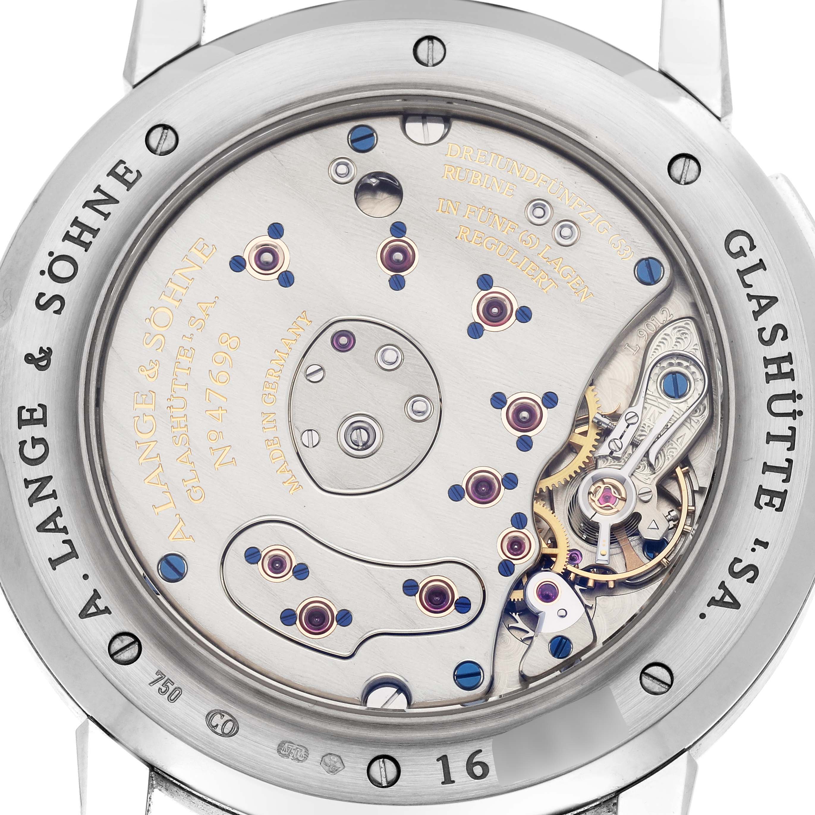 The image shows the rear view of the A. Lange & Söhne Lange 1 model 115.029 watch, highlighting its intricate movement and mechanical components.