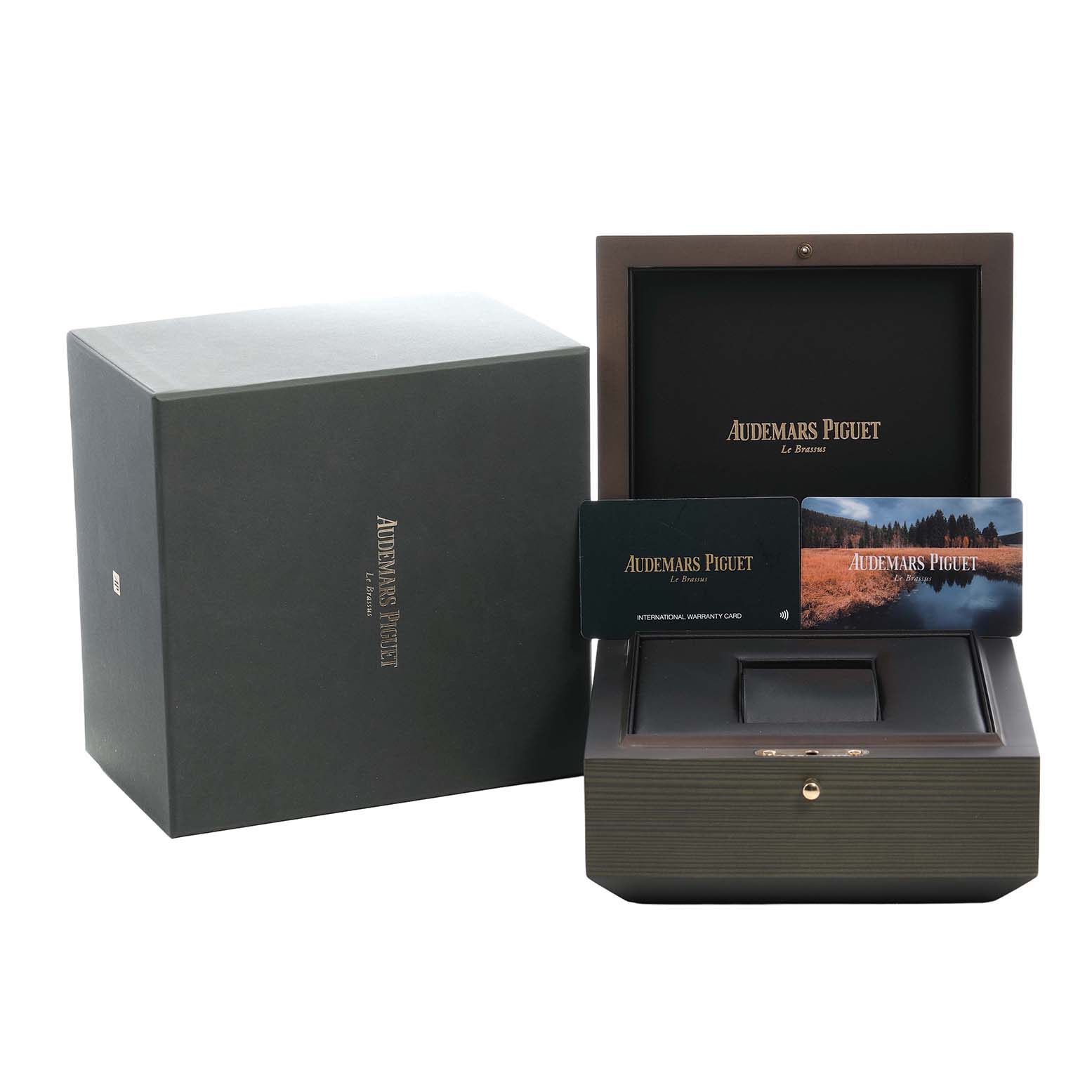 The image shows the packaging and warranty cards for the Royal Oak Offshore by Audemars Piguet.