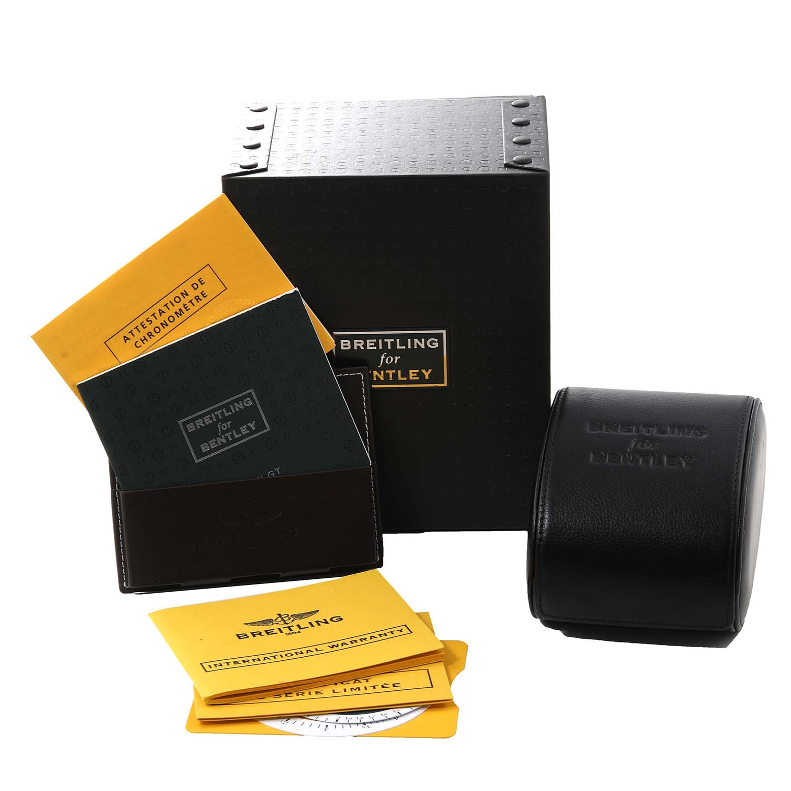 The image shows packaging and documentation for a Breitling for Bentley watch, including a box, case, and warranty papers.