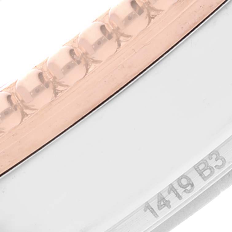 This image shows a close-up of the case edge and part of the bezel of a Breitling Navitimer U17326 Men
s Stainless Steel Grey Dial U17326 Men
s Stainless Steel Grey Dial watch.