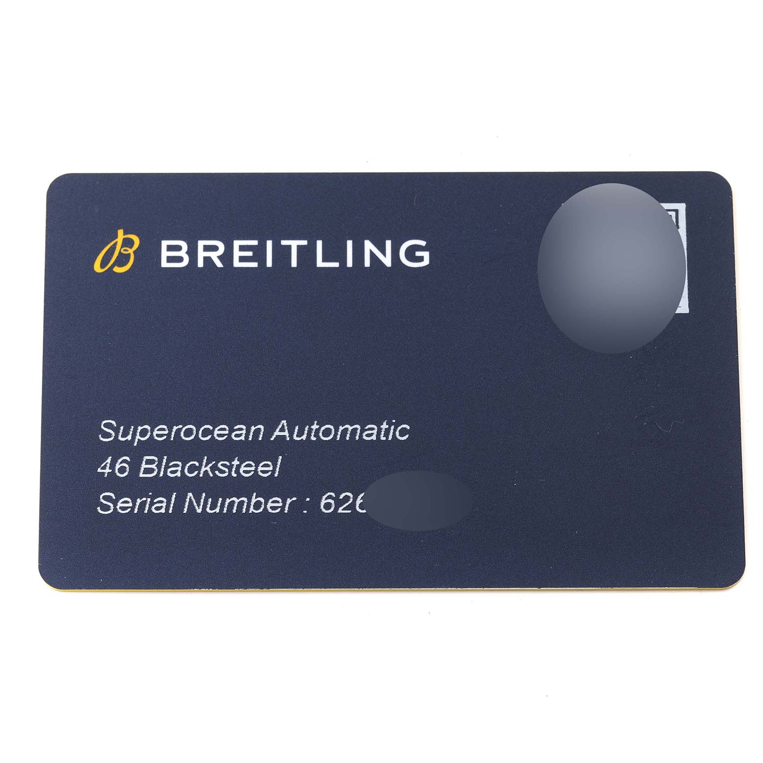 This image shows a Breitling Superocean M17368 Men's Stainless Steel Black Dial M17368 Men's Stainless Steel Black Dial Automatic 46 Blacksteel warranty card with the serial number obscured.