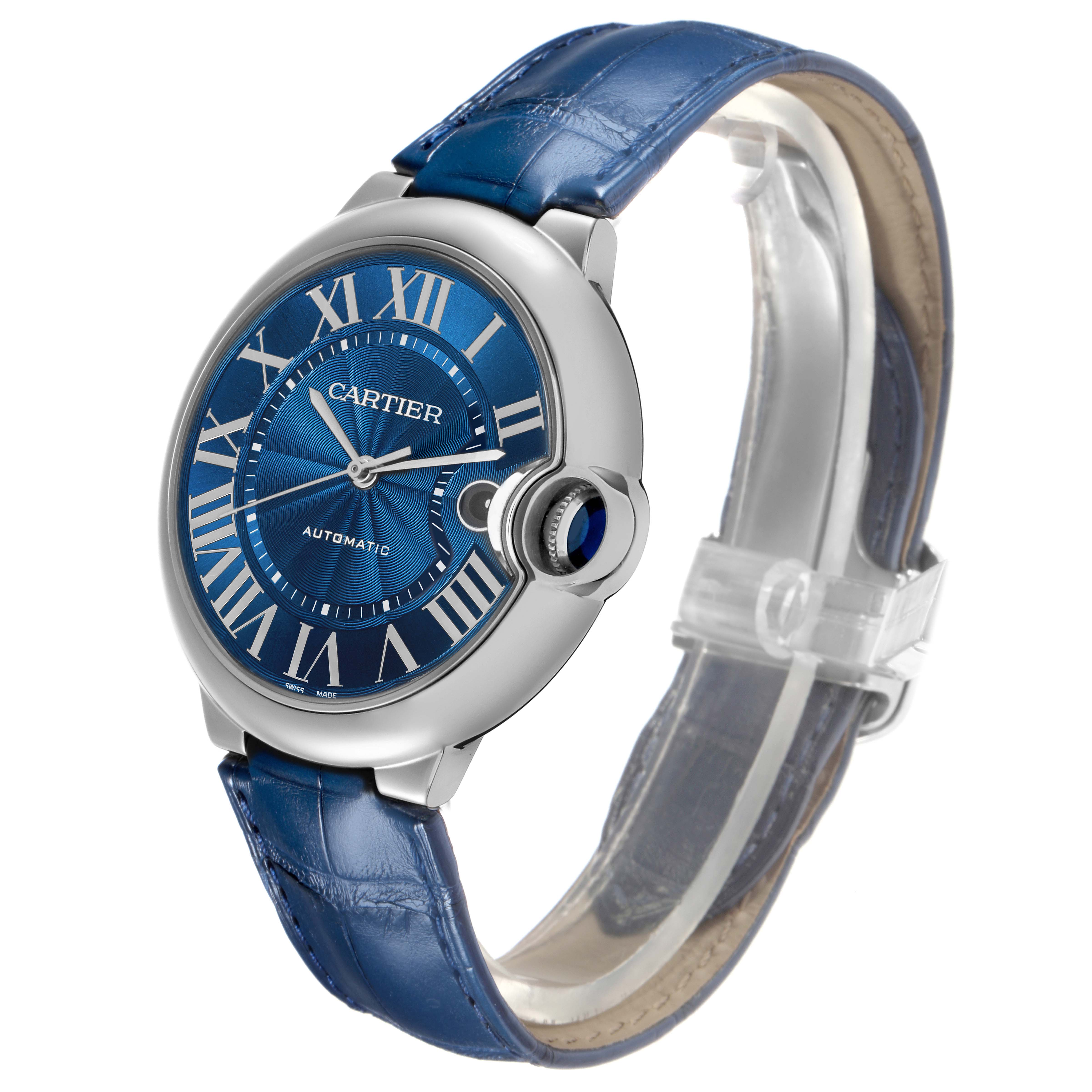 The image shows a Cartier Ballon Bleu model WSBB0027 men's watch at a three-quarter angle displaying the blue dial, Roman numerals, and blue leather strap.