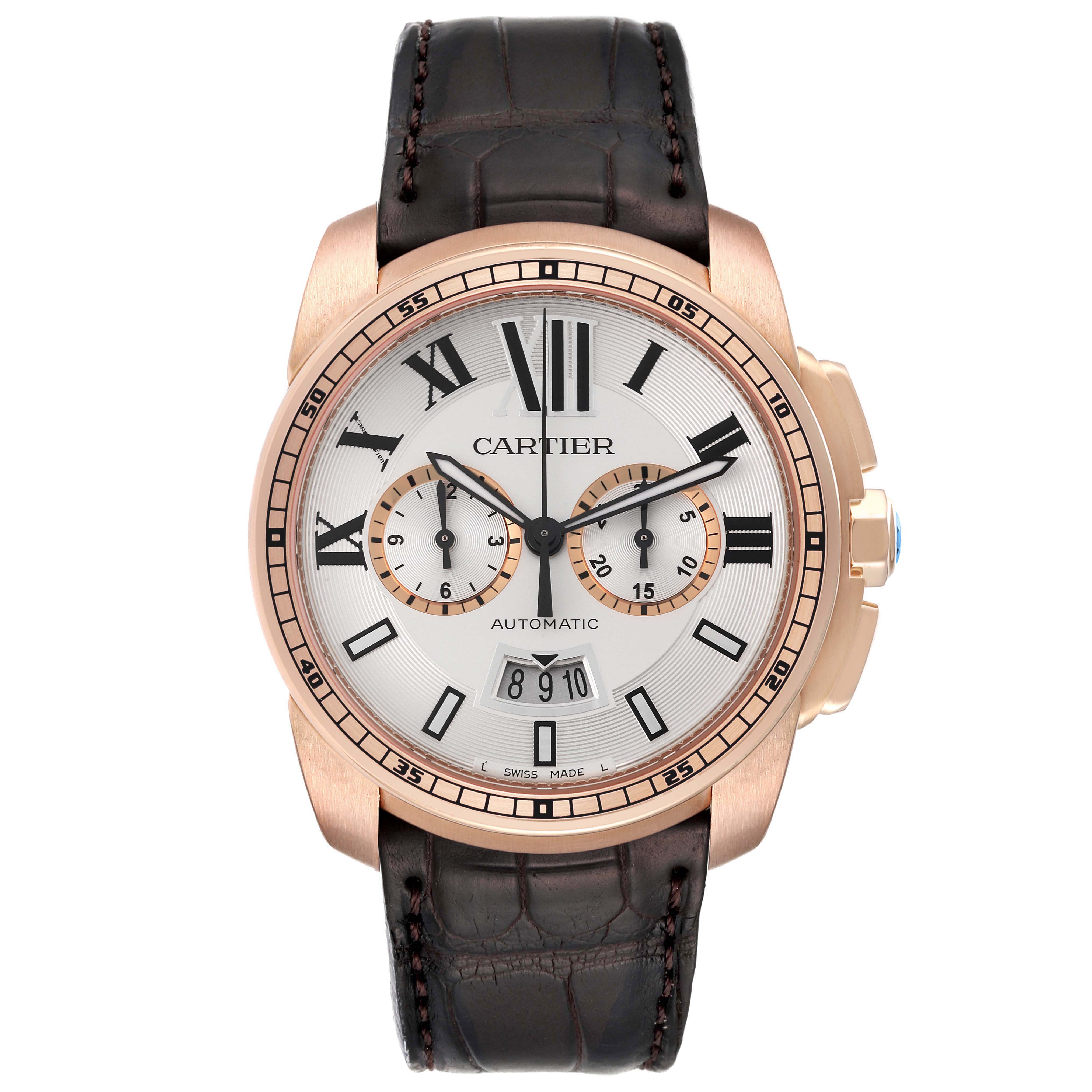 The Calibre de Cartier watch is shown from the front, displaying its face, strap, crown, and subdials.