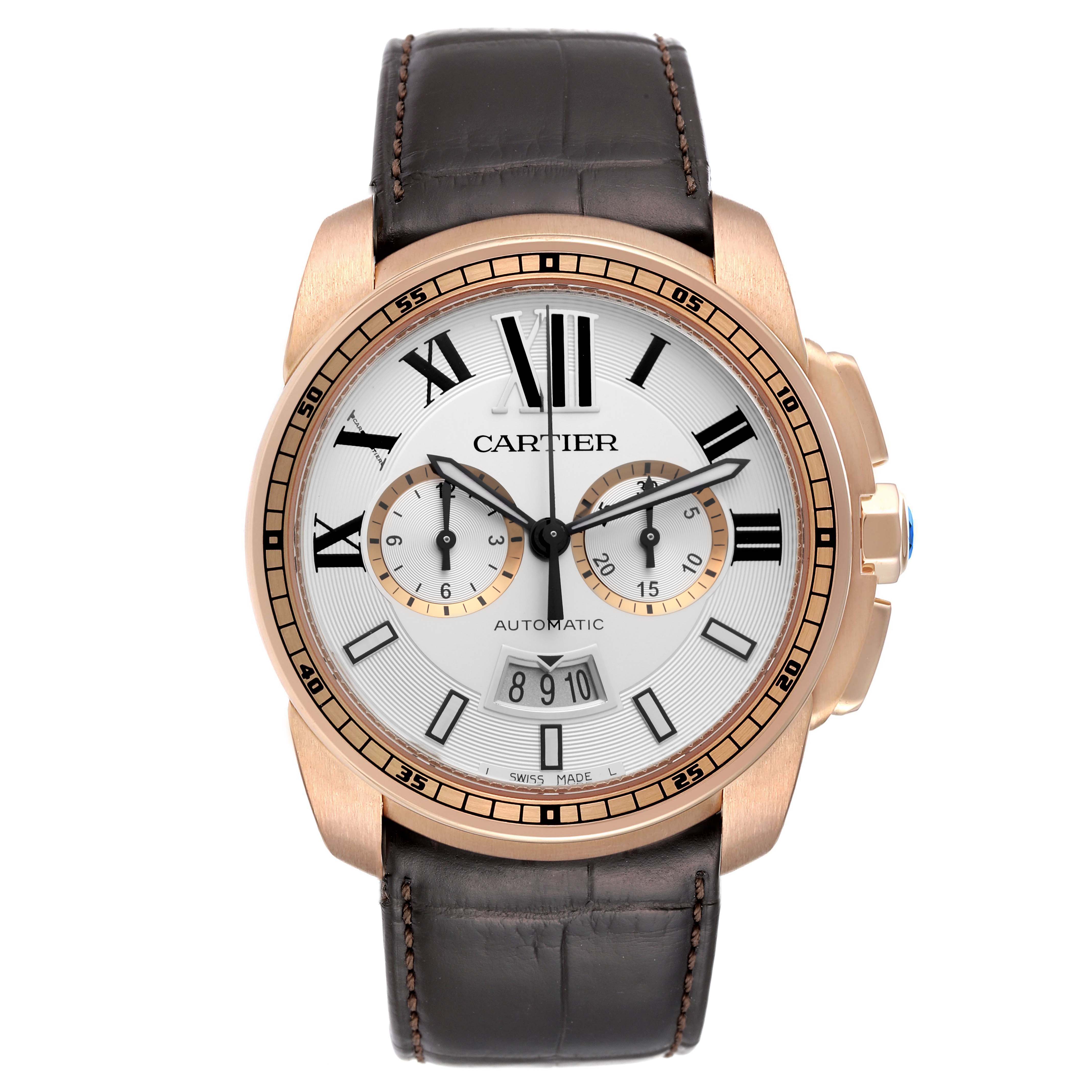 The image shows a front view of a Calibre de Cartier watch by Cartier, highlighting its dial, roman numerals, and leather strap.