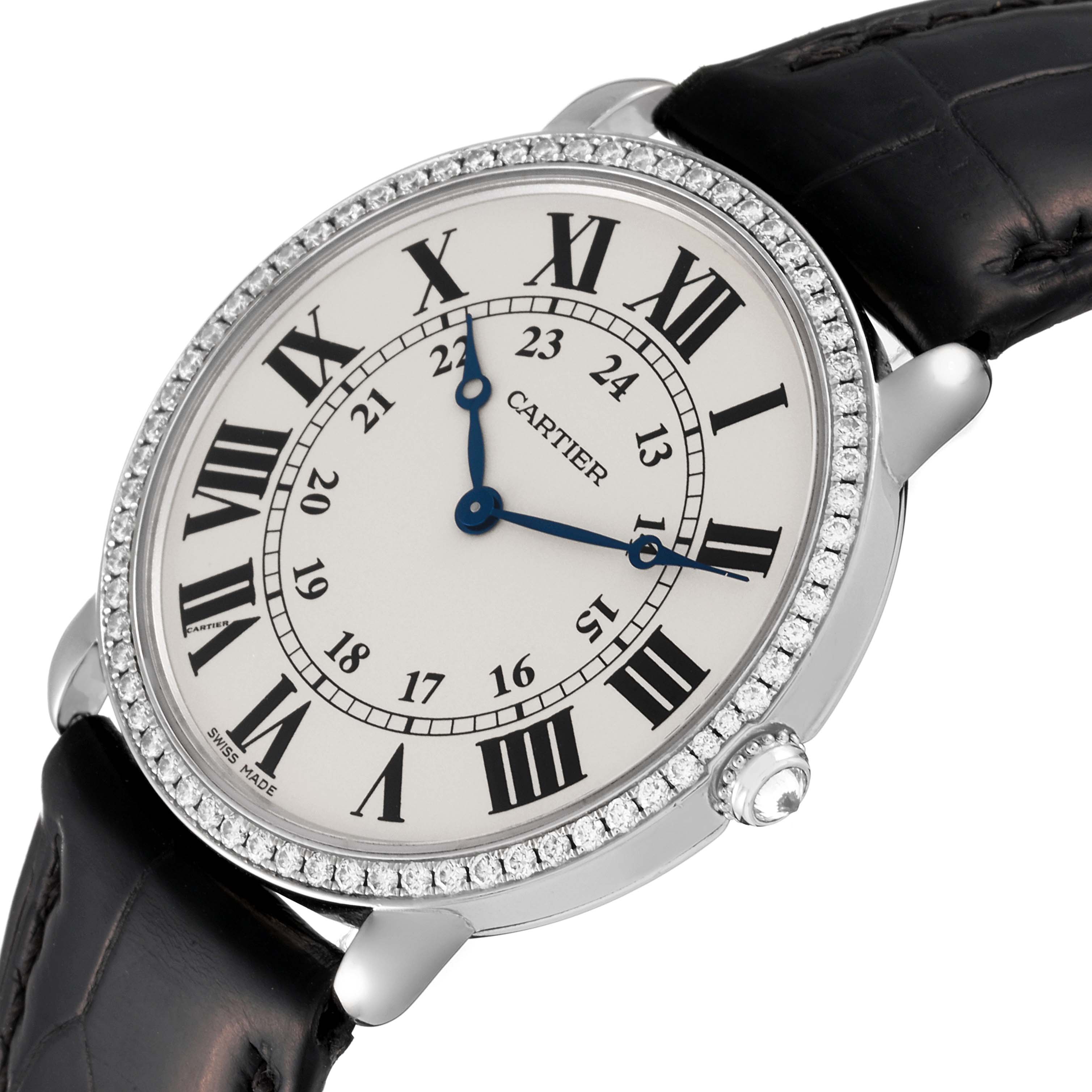 The image shows a Cartier Ronde WR000551 Women's White Gold Silver Dial WR000551 Women's White Gold Silver Dial model watch from a frontal angle, highlighting its black leather strap and diamond-studded bezel.