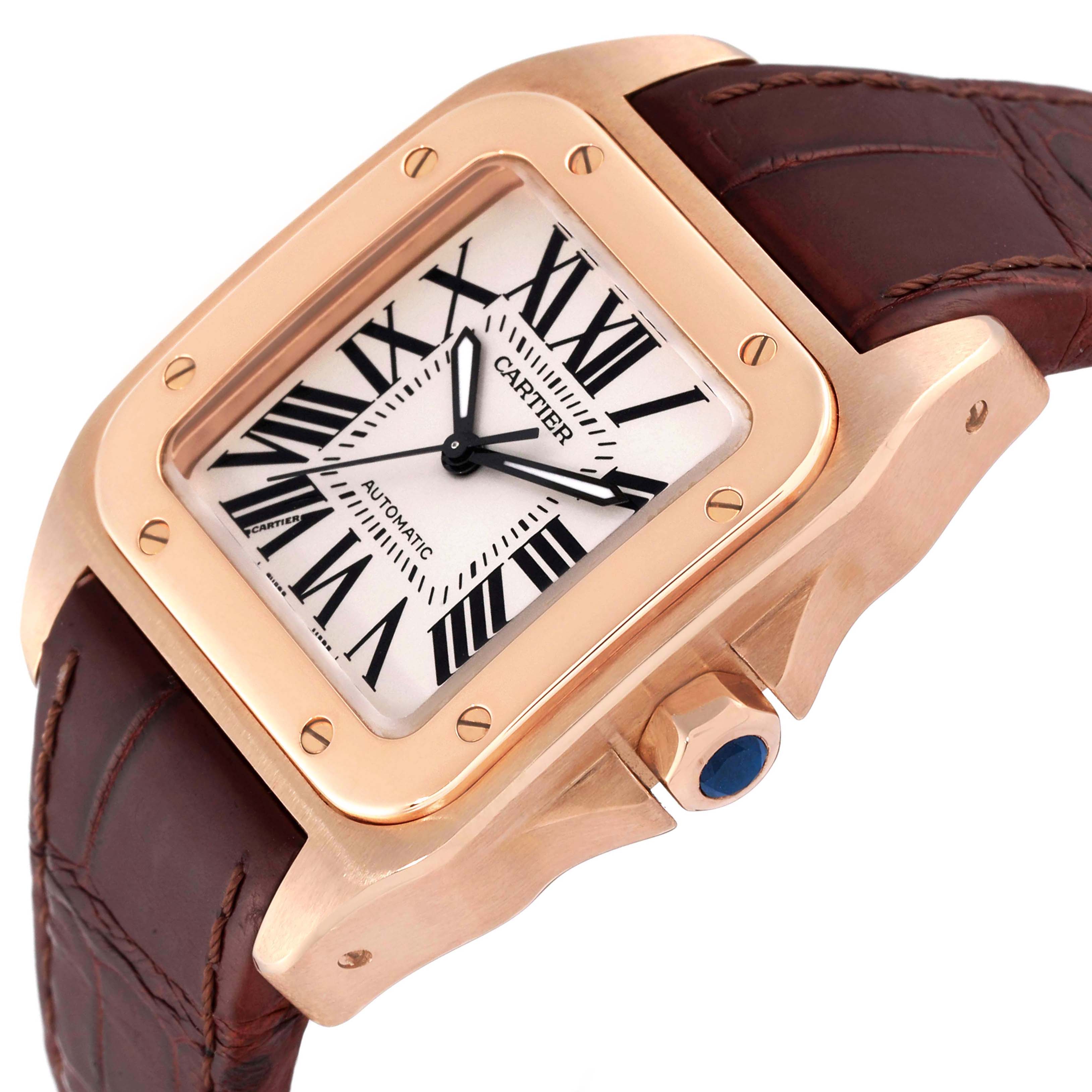The image shows a close-up angle of a Cartier Santos W20108Y1 Men's Rose Gold Silver Dial W20108Y1 Men's Rose Gold Silver Dial model watch, highlighting the dial, bezel, crown, and leather strap.