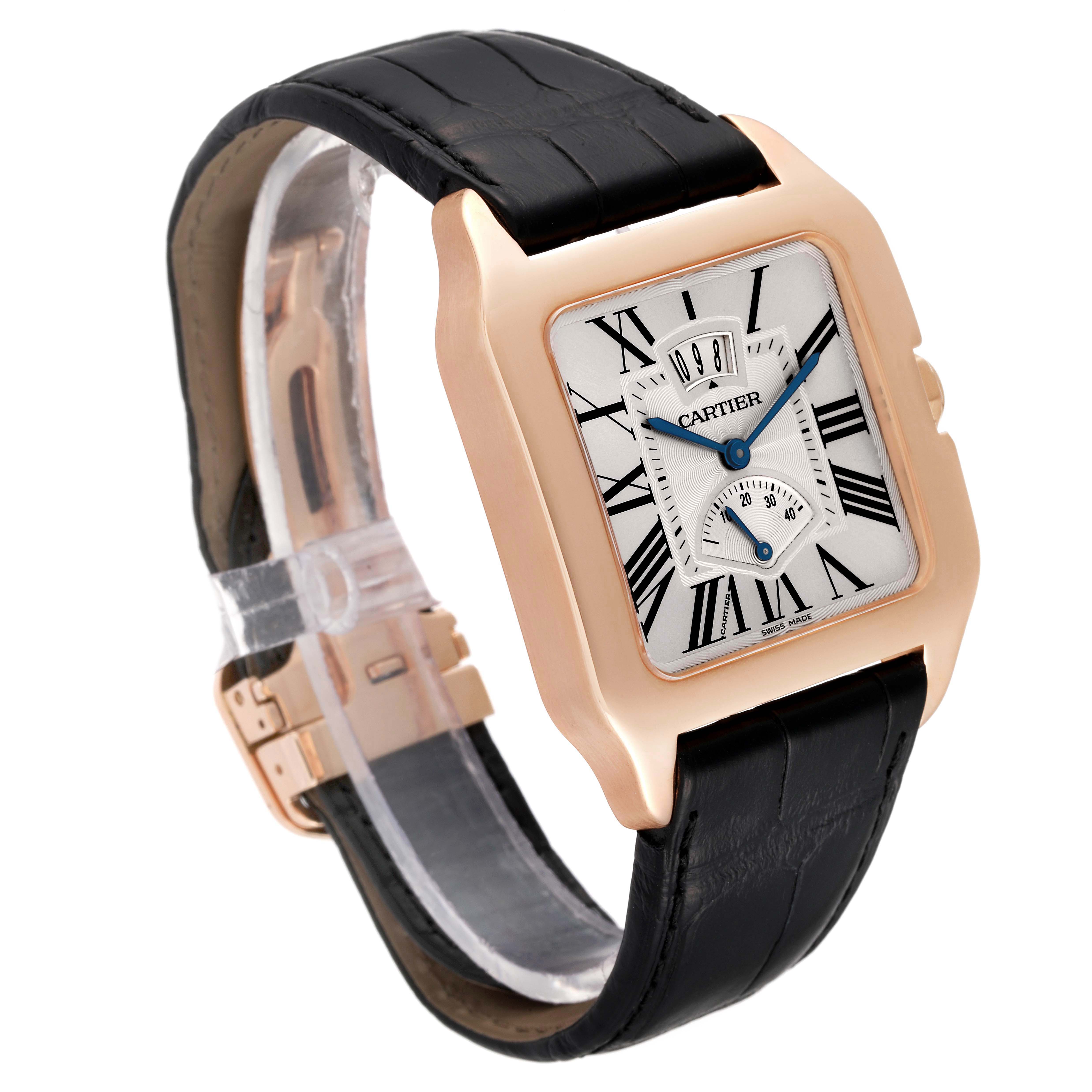 The Cartier Santos Dumont W2020067 Men's Rose Gold Silver Dial W2020067 Men's Rose Gold Silver Dial watch is shown at an angle displaying the face, bezel, and leather strap.