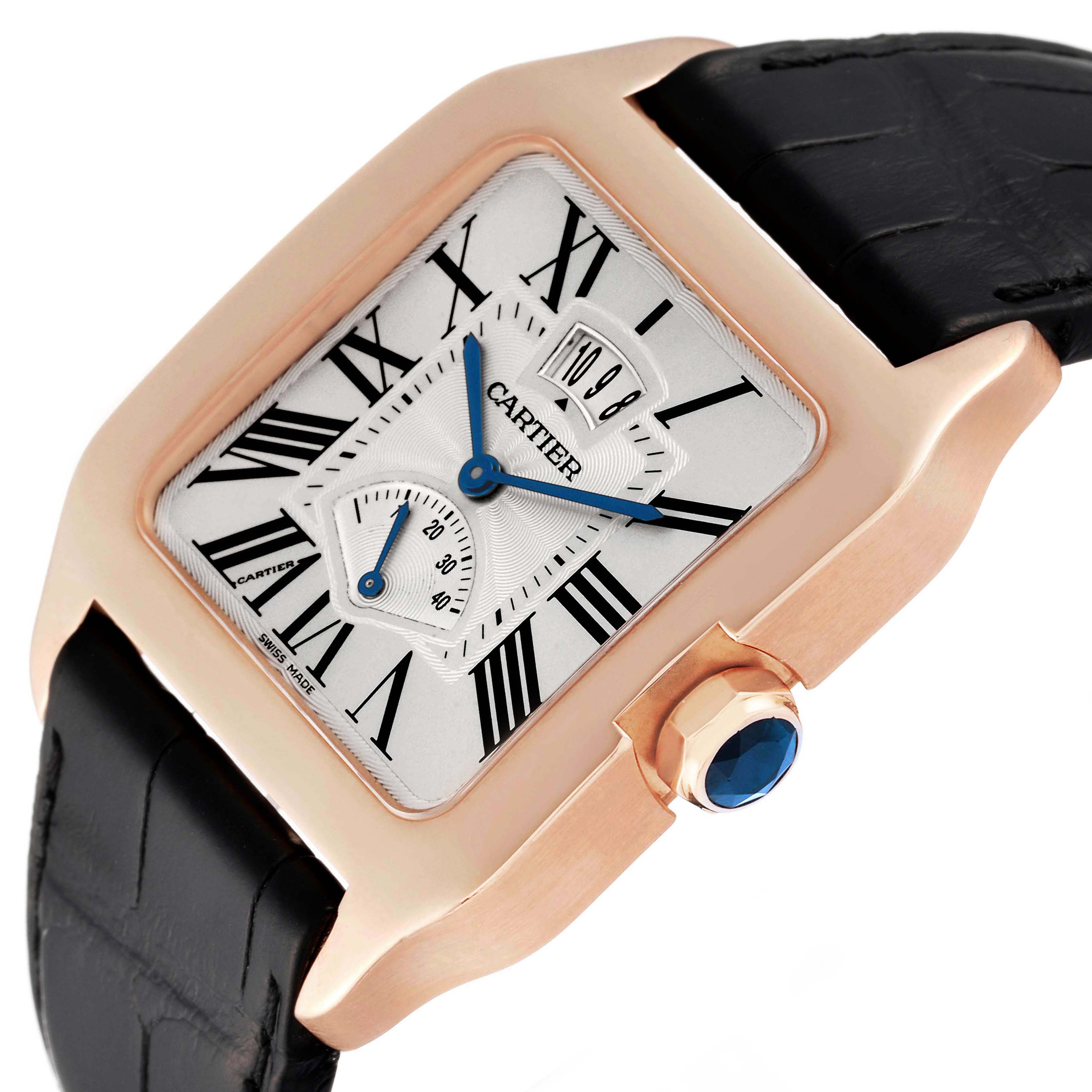 The image shows a close-up view of a Cartier Santos Dumont W2020067 Men's Rose Gold Silver Dial W2020067 Men's Rose Gold Silver Dial watch featuring its dial, case, and part of the leather strap.