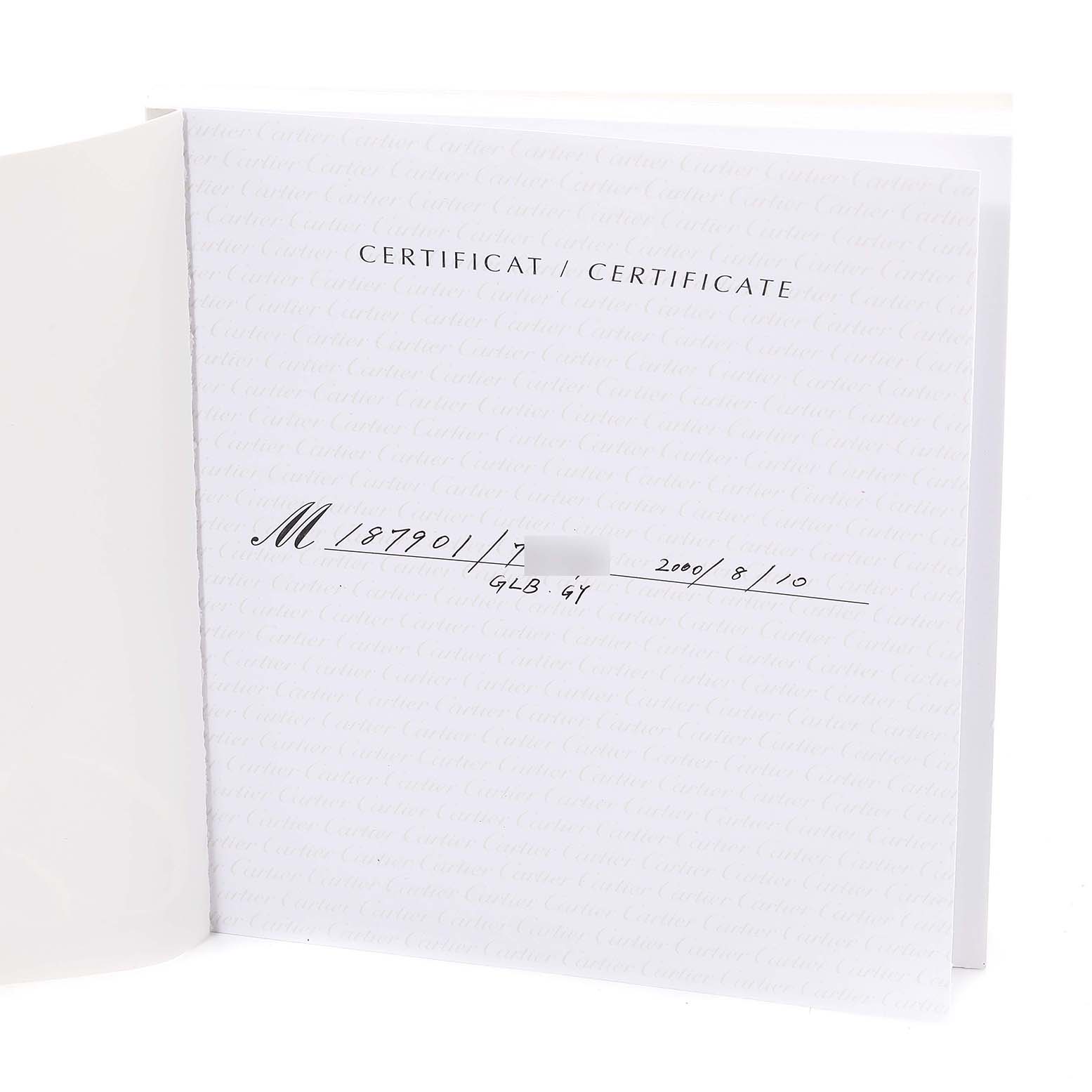 The image shows a warranty certificate booklet for the Santos model by Cartier, featuring handwritten details.