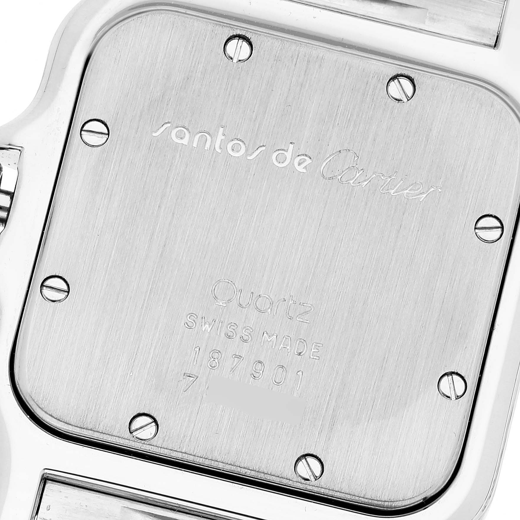 This image shows the back case of a Santos model by Cartier, highlighting its engravings and screws.
