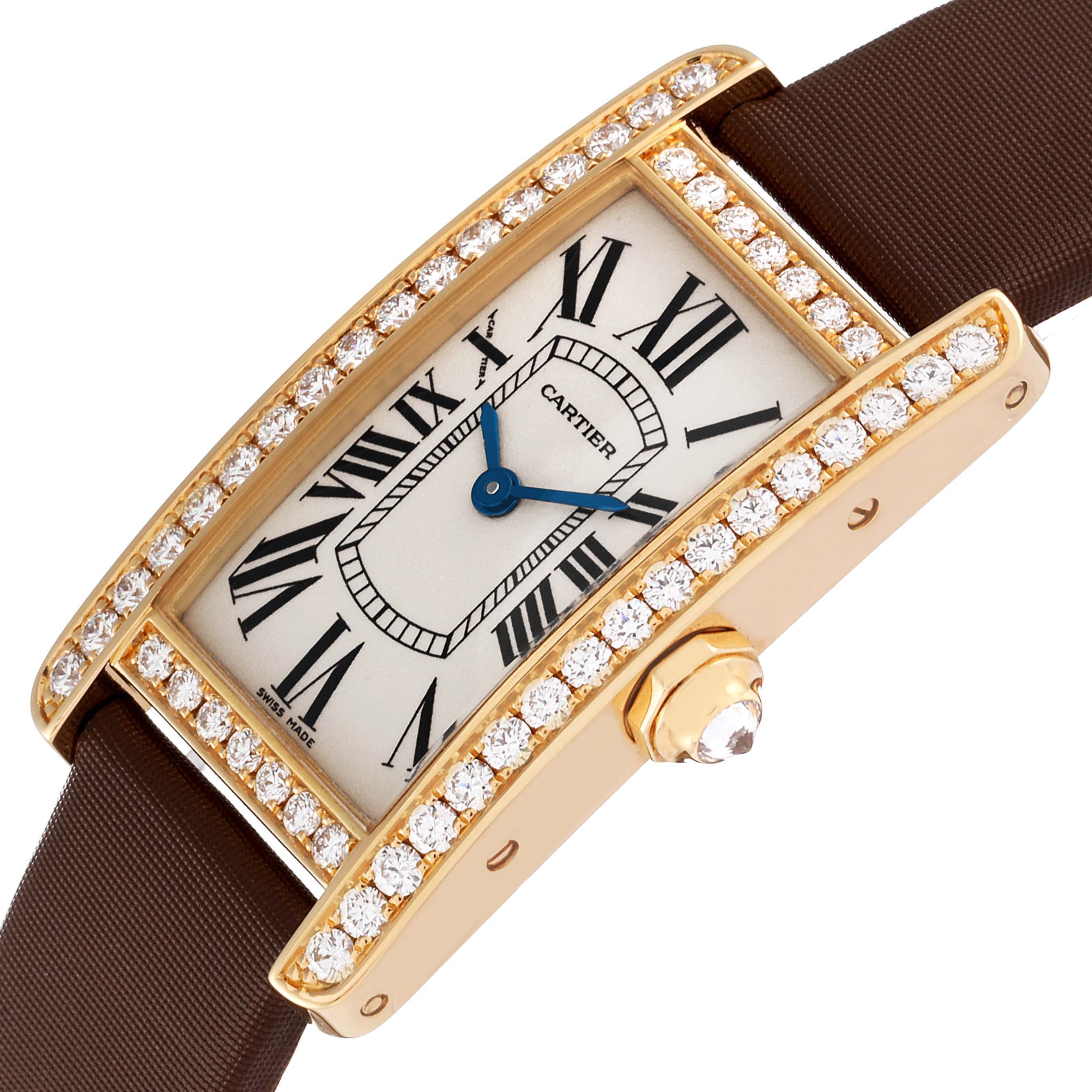 The Cartier Tank Americaine WB707231 Women's Yellow Gold Silver Dial WB707231 Women's Yellow Gold Silver Dial watch is shown at an angle highlighting its diamond-encrusted bezel, dial, and crown.