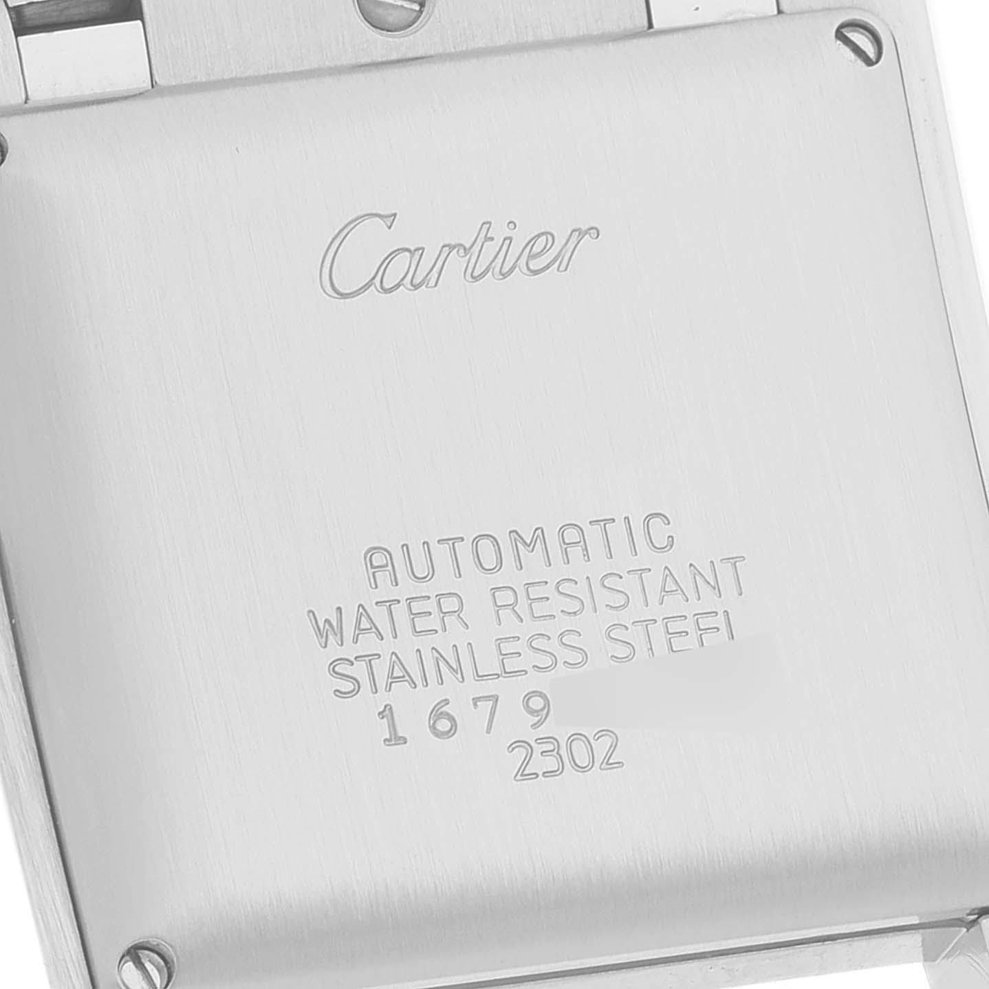 The image shows the back of a Cartier Tank Francaise W51002Q3 Men's Stainless Steel Silver Dial W51002Q3 Men's Stainless Steel Silver Dial watch, including engravings on the stainless steel case back.