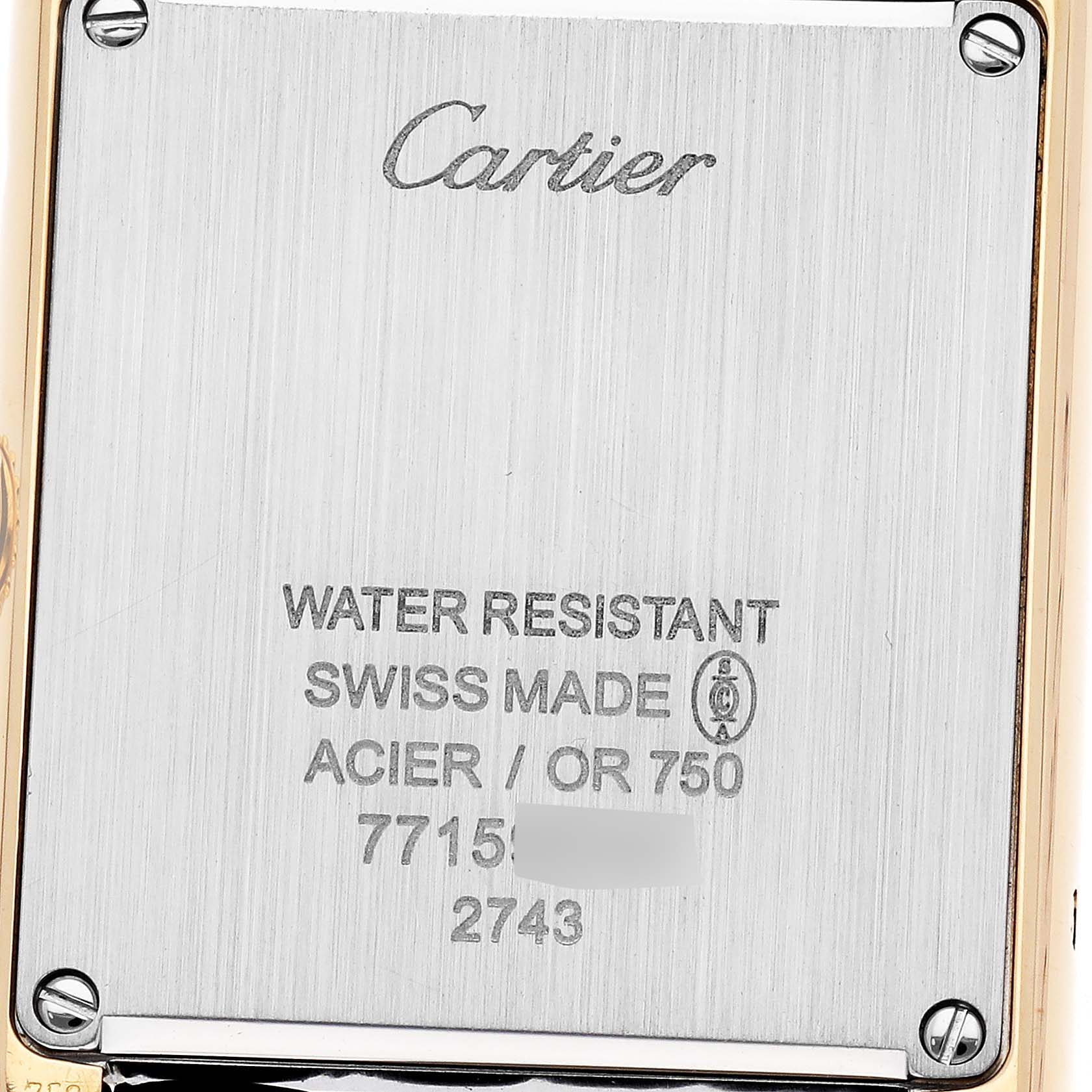 The image shows the back case of a Cartier Tank Solo watch, model number W1018755, highlighting branding and water resistance details.