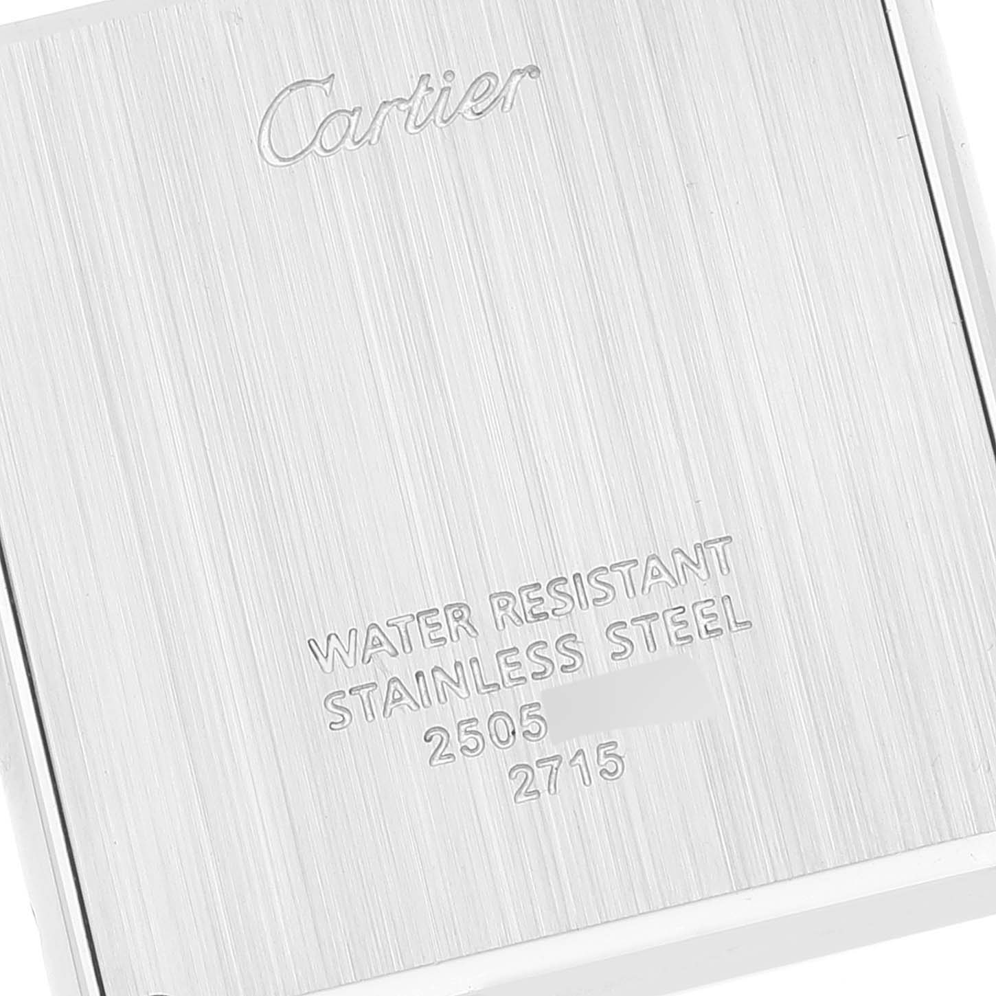 This image shows the back casing of the Cartier Tank Solo W1018355 Men's Stainless Steel Silver Dial W1018355 Men's Stainless Steel Silver Dial watch, highlighting the brand logo and details about water resistance and material.