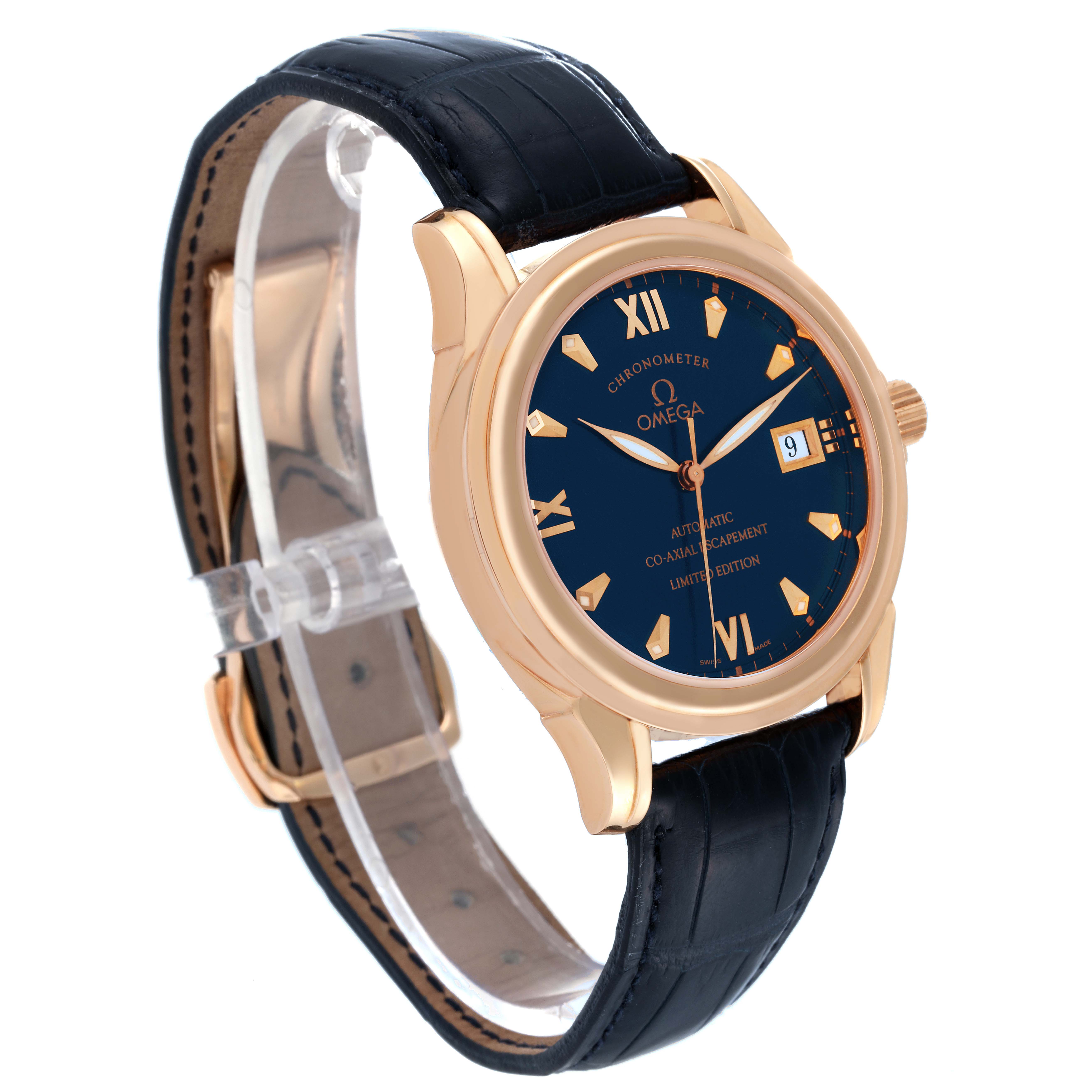 The image shows an Omega De Ville 5931.81.23 Men's Rose Gold Blue Dial 5931.81.23 Men's Rose Gold Blue Dial watch at a slight side angle, highlighting its dial, case, crown, and strap.