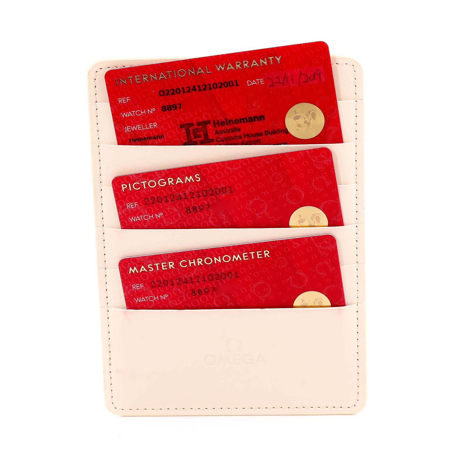 The image shows warranty and certification cards for the Omega Aqua Terra 220.12.41.21.02.001 Men
s Stainless Steel Silver Dial 220.12.41.21.02.001 Men
s Stainless Steel Silver Dial model, displayed in a white cardholder.