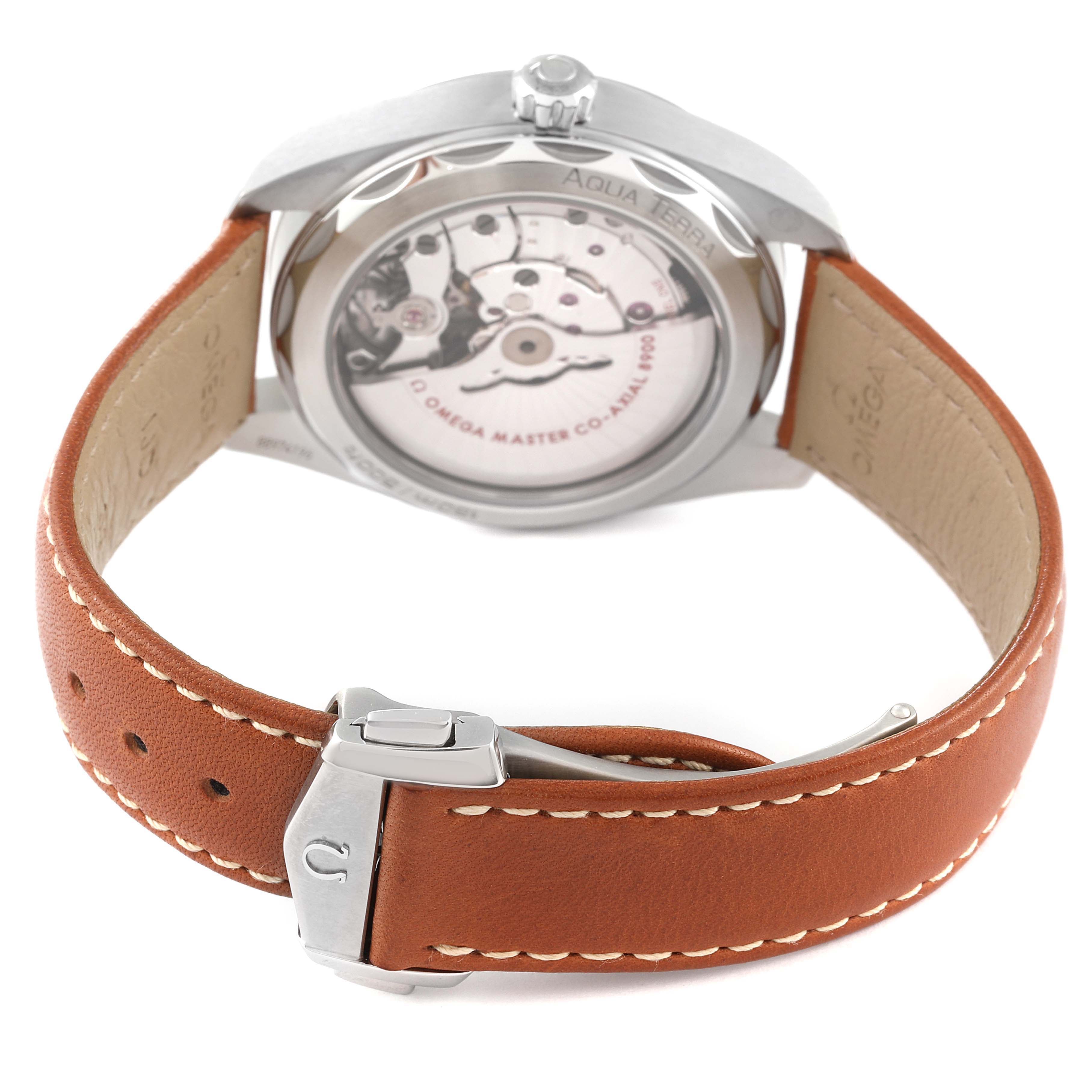 This image shows the back and side of an Omega Aqua Terra 220.12.41.21.02.001 Men
s Stainless Steel Silver Dial 220.12.41.21.02.001 Men
s Stainless Steel Silver Dial watch, highlighting the movement and leather strap
s clasp.
