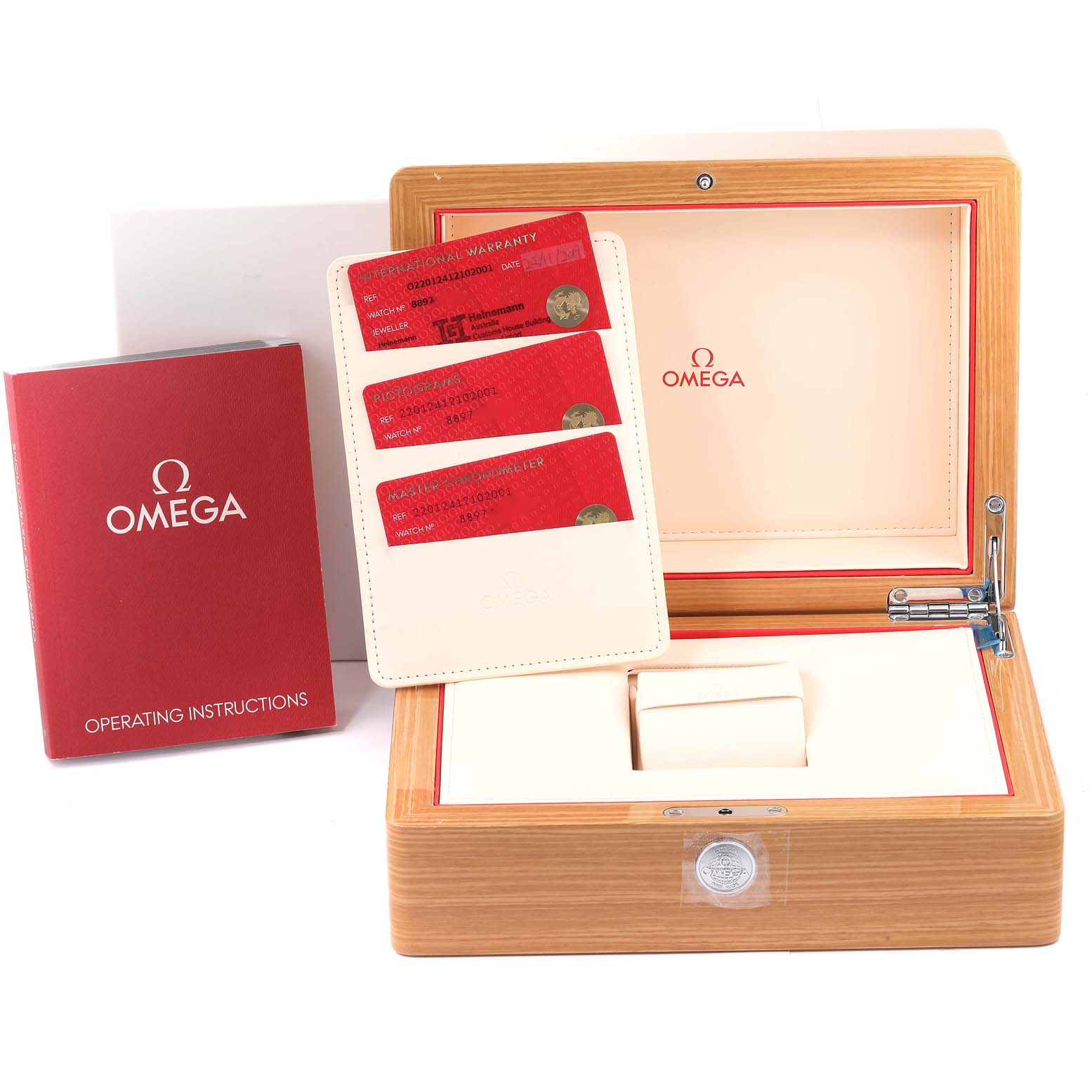 The image shows an Omega Aqua Terra 220.12.41.21.02.001 Men
s Stainless Steel Silver Dial 220.12.41.21.02.001 Men
s Stainless Steel Silver Dial watch box, operating instructions, and warranty cards.