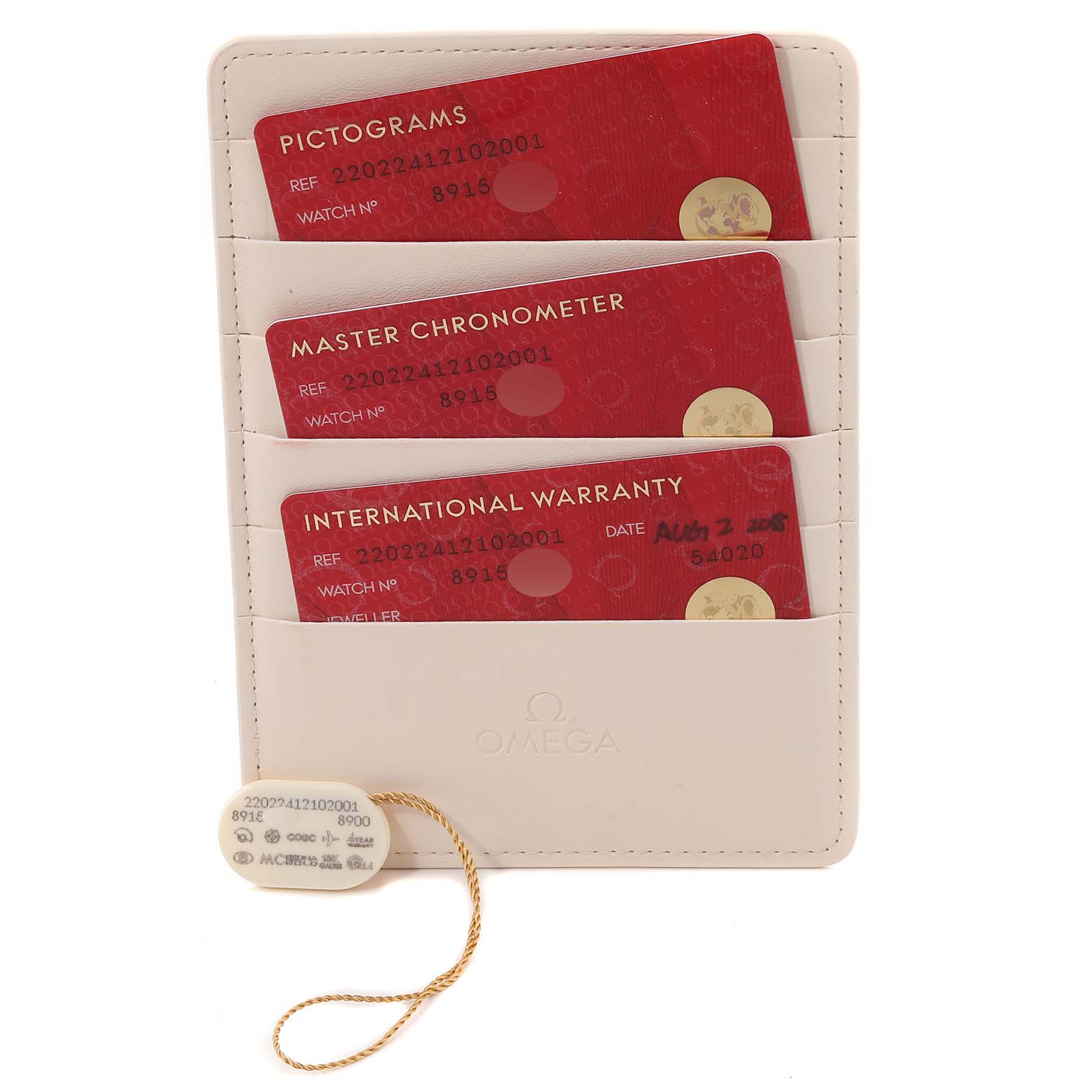 The image shows warranty and certification cards for an Omega Aqua Terra 220.22.41.21.02.001 Men's Steel and Gold (two tone) Silver Dial 220.22.41.21.02.001 Men's Steel and Gold (two tone) Silver Dial watch, along with a tag, all placed in a white holder.