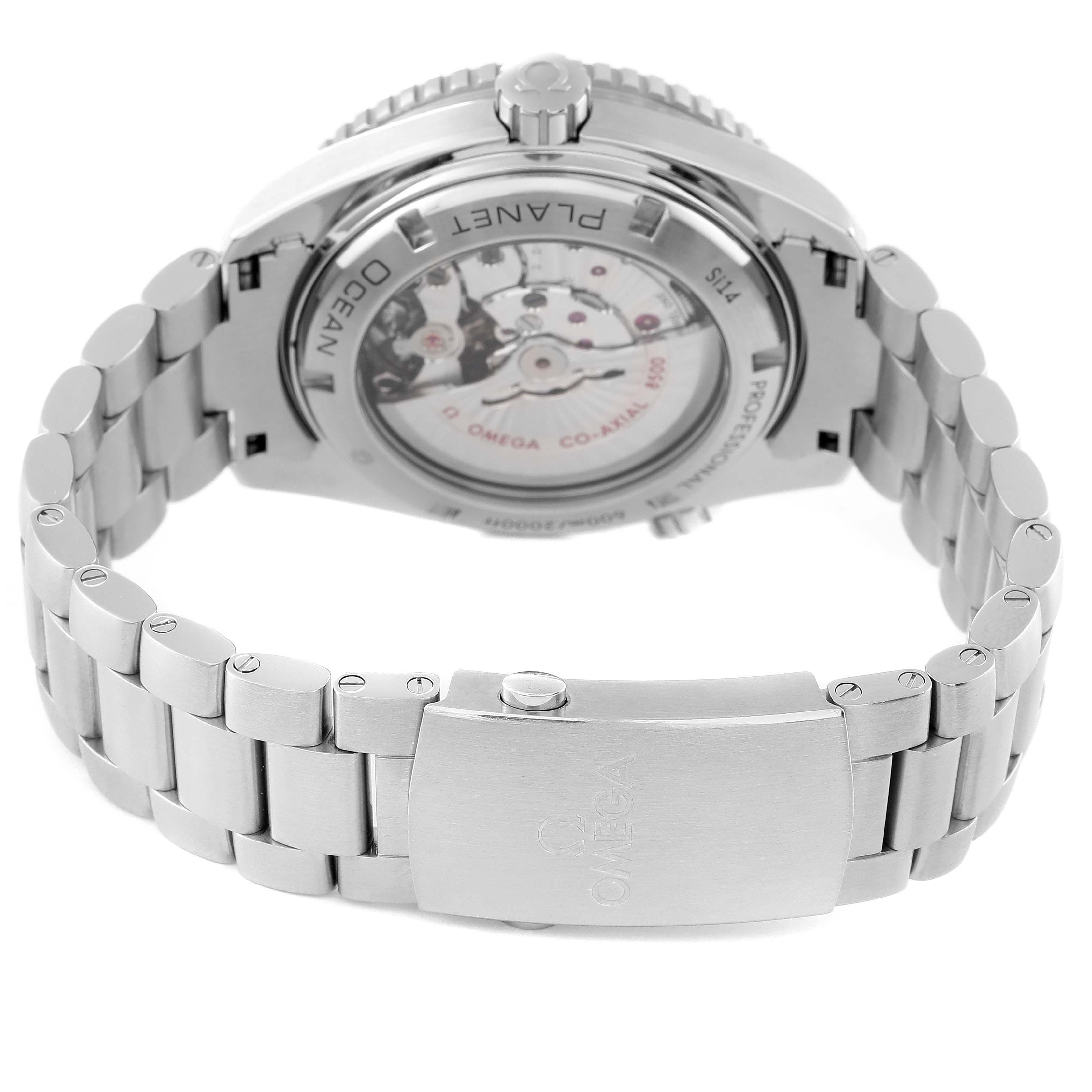 The image shows the back view of an Omega Planet Ocean 232.30.46.21.01.001 Men
s Stainless Steel Black Dial 232.30.46.21.01.001 Men
s Stainless Steel Black Dial watch, highlighting the clasp and see-through case back displaying its movement.