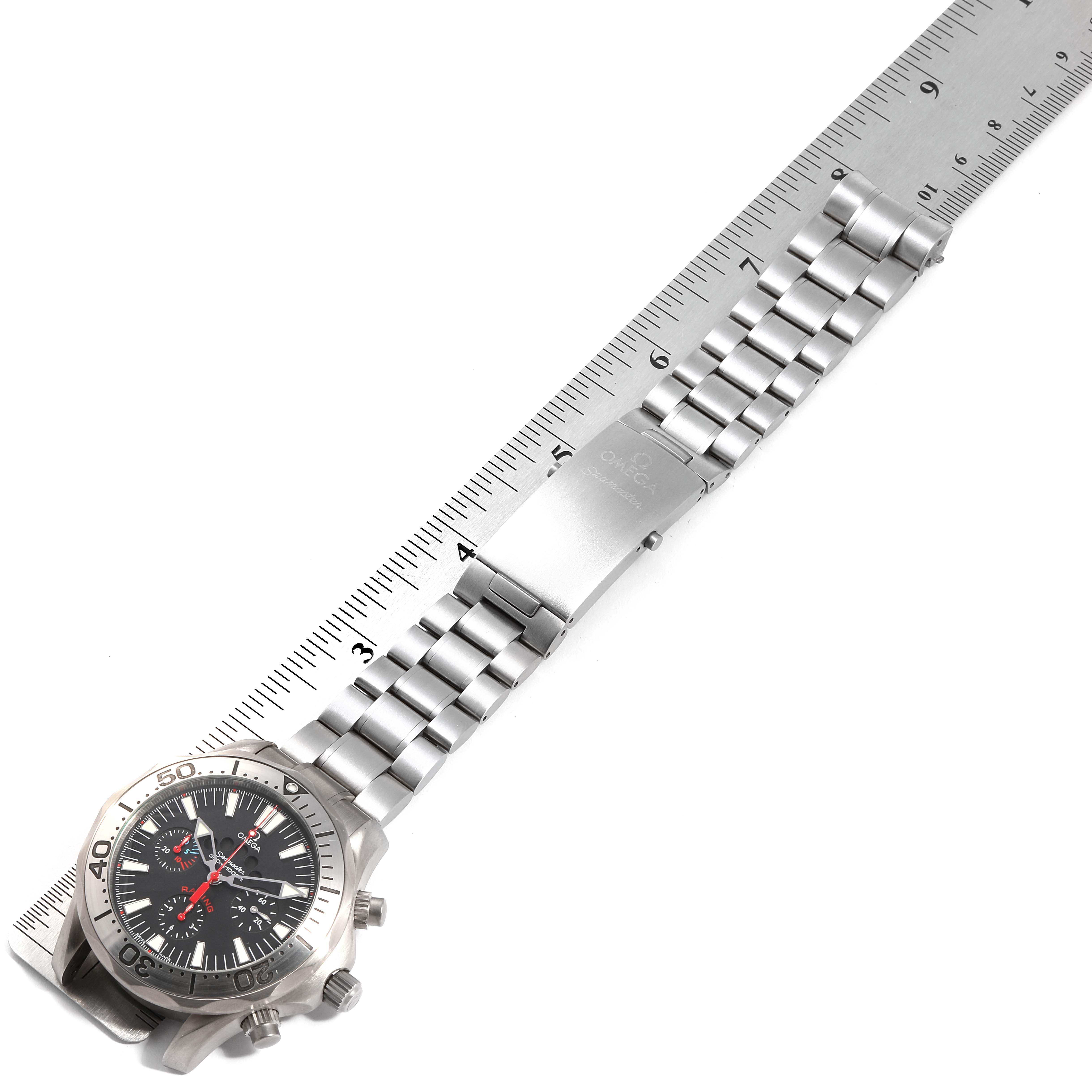 The image shows an Omega Seamaster 2269.52.00 Men's Titanium Black Dial 2269.52.00 Men's Titanium Black Dial watch laid flat alongside a ruler, displaying the watch face and metal bracelet.