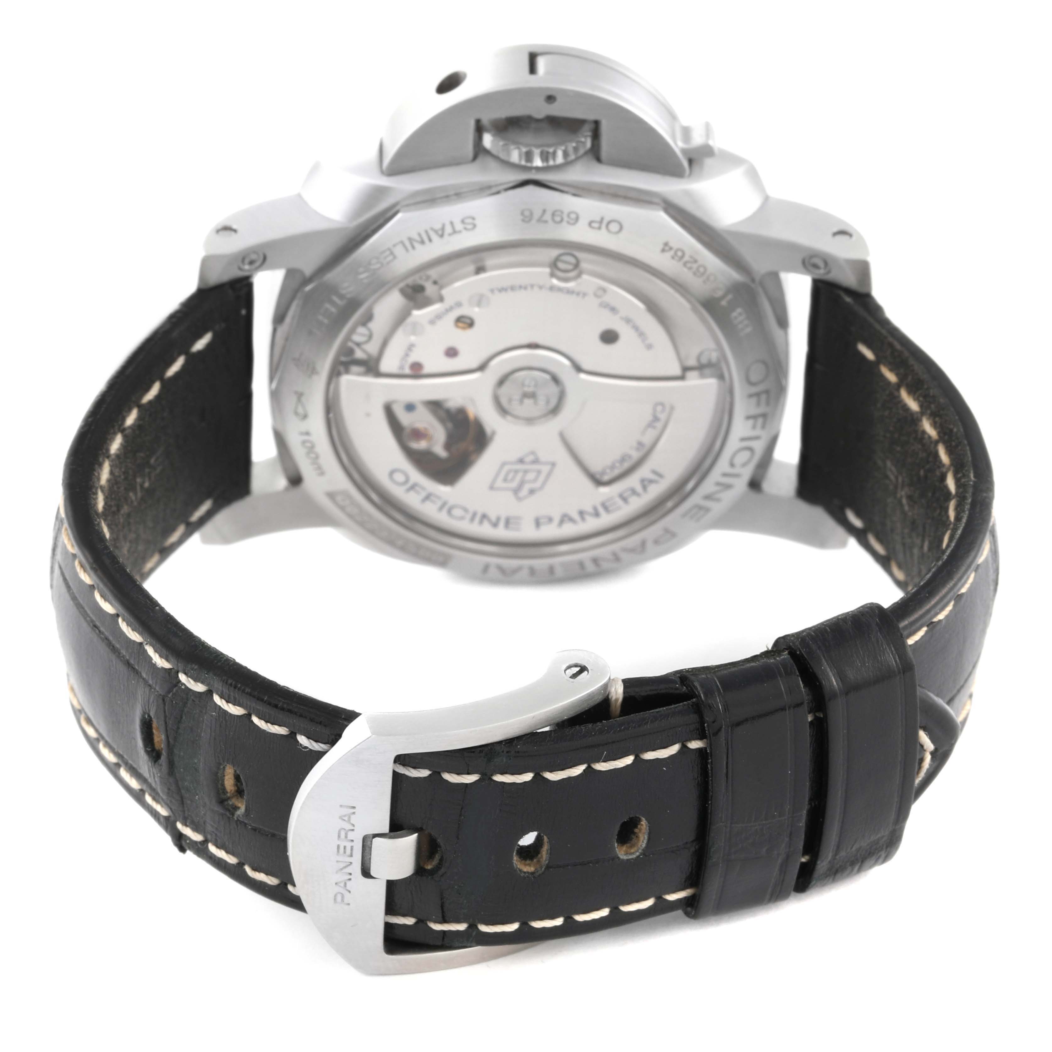 The image shows the back view of a Panerai Luminor PAM00392 Men
s Stainless Steel Black Dial PAM00392 Men
s Stainless Steel Black Dial watch, highlighting its open case back and leather strap with clasp.