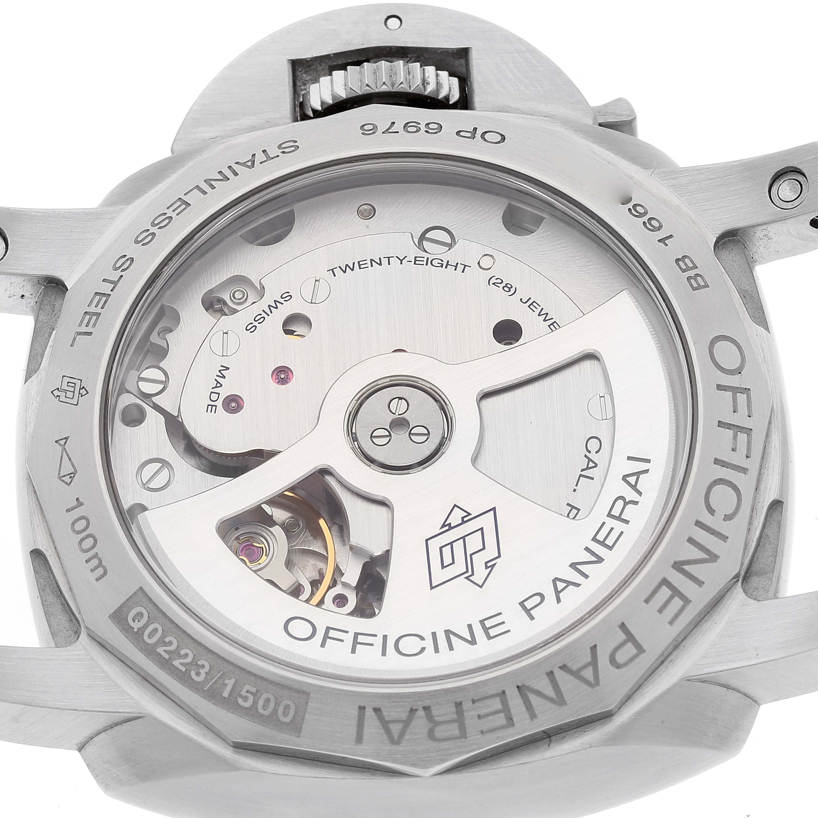 The image shows the back view of a Panerai Luminor PAM00392 Men
s Stainless Steel Black Dial PAM00392 Men
s Stainless Steel Black Dial watch, revealing its internal mechanics and inscriptions.