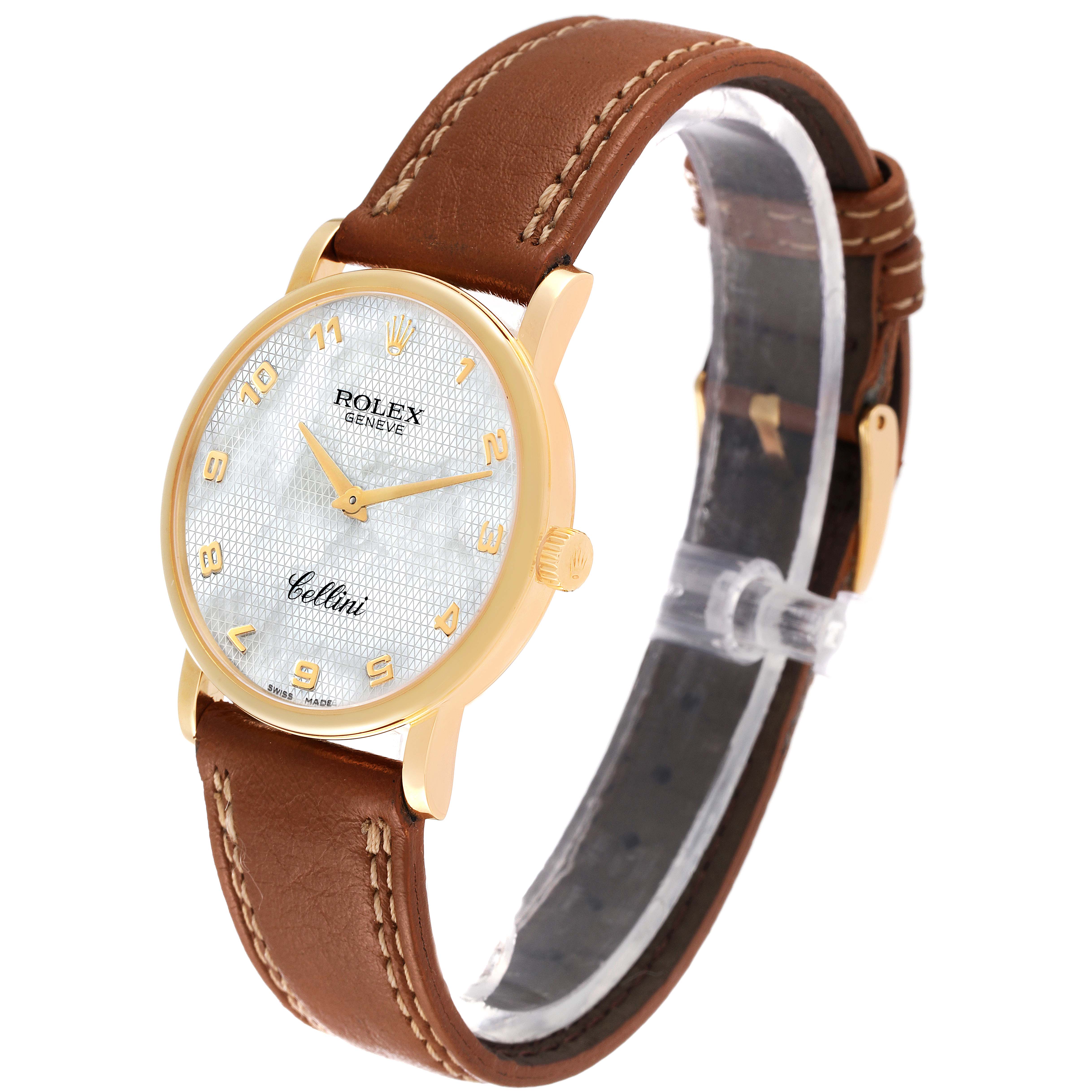 The watch is a Rolex Cellini 5115 Women's Yellow Gold Mother of Pearl Dial 5115 Women's Yellow Gold Mother of Pearl Dial model, shown at an angled view focusing on the face, hands, and brown leather strap.