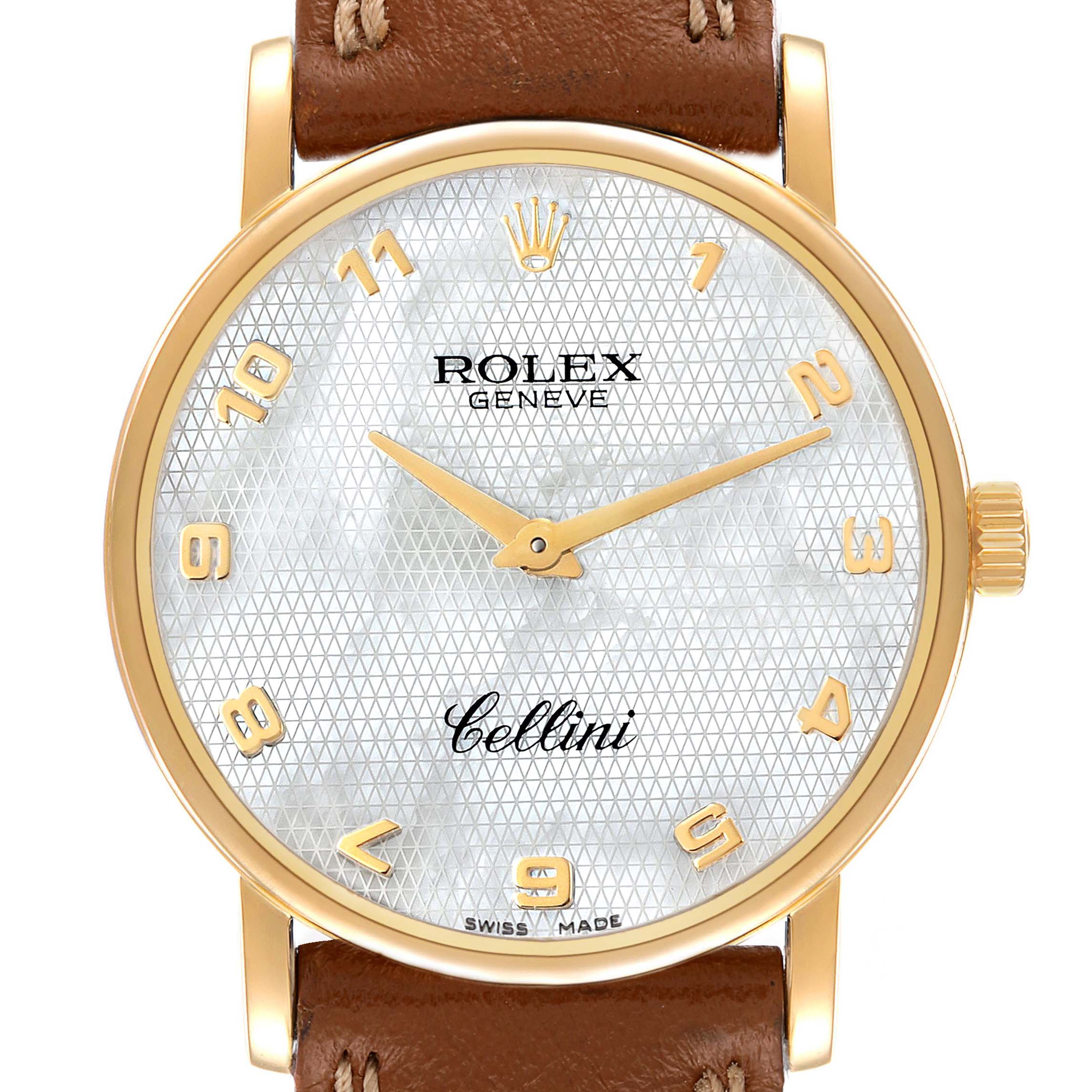The image shows a front view of a Rolex Cellini 5115 Women's Yellow Gold Mother of Pearl Dial 5115 Women's Yellow Gold Mother of Pearl Dial watch featuring a gold case, white dial, gold numerals, and a brown leather strap.