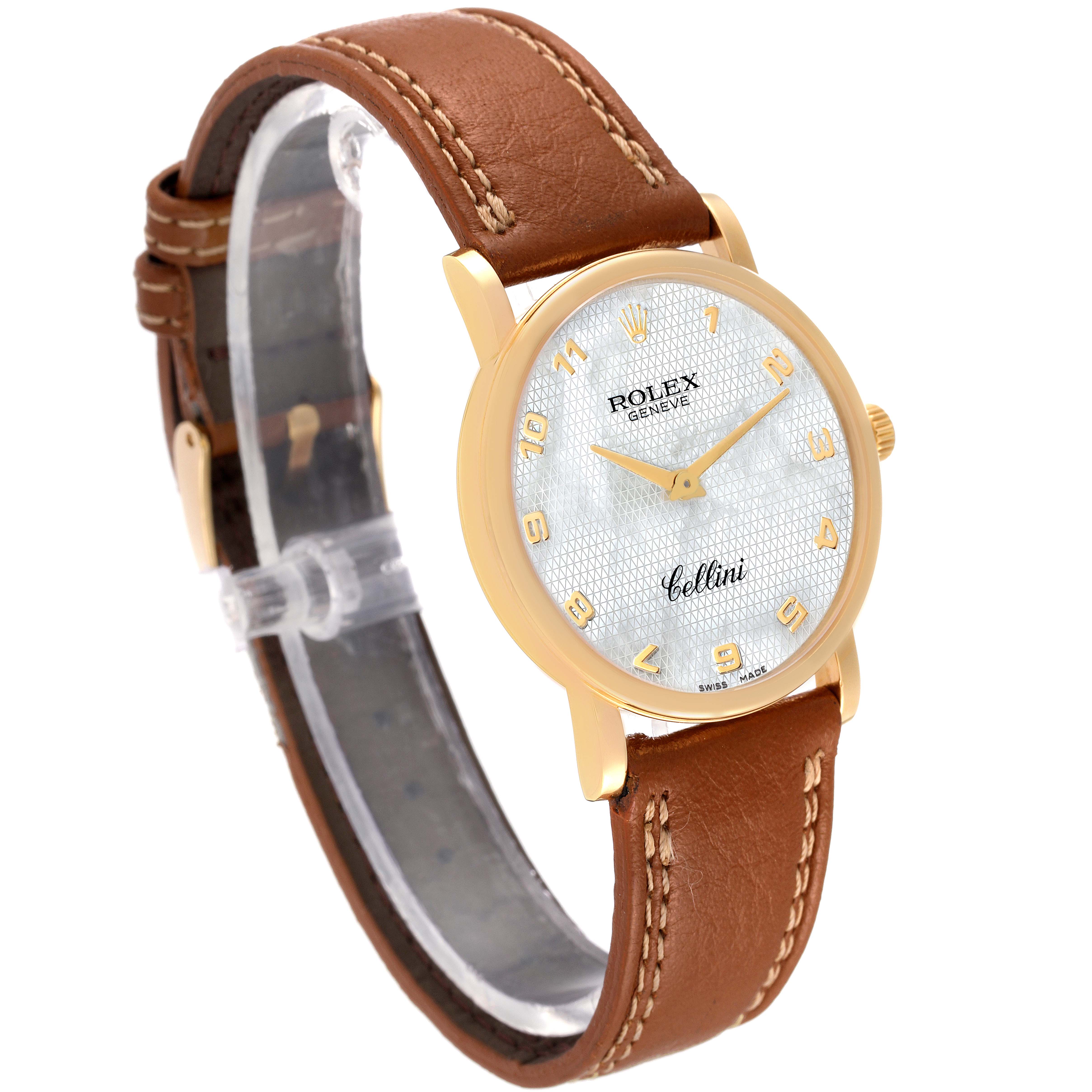 The image shows a Rolex Cellini 5115 Women's Yellow Gold Mother of Pearl Dial 5115 Women's Yellow Gold Mother of Pearl Dial watch from a front angle, highlighting its white dial, gold case, and brown leather strap.