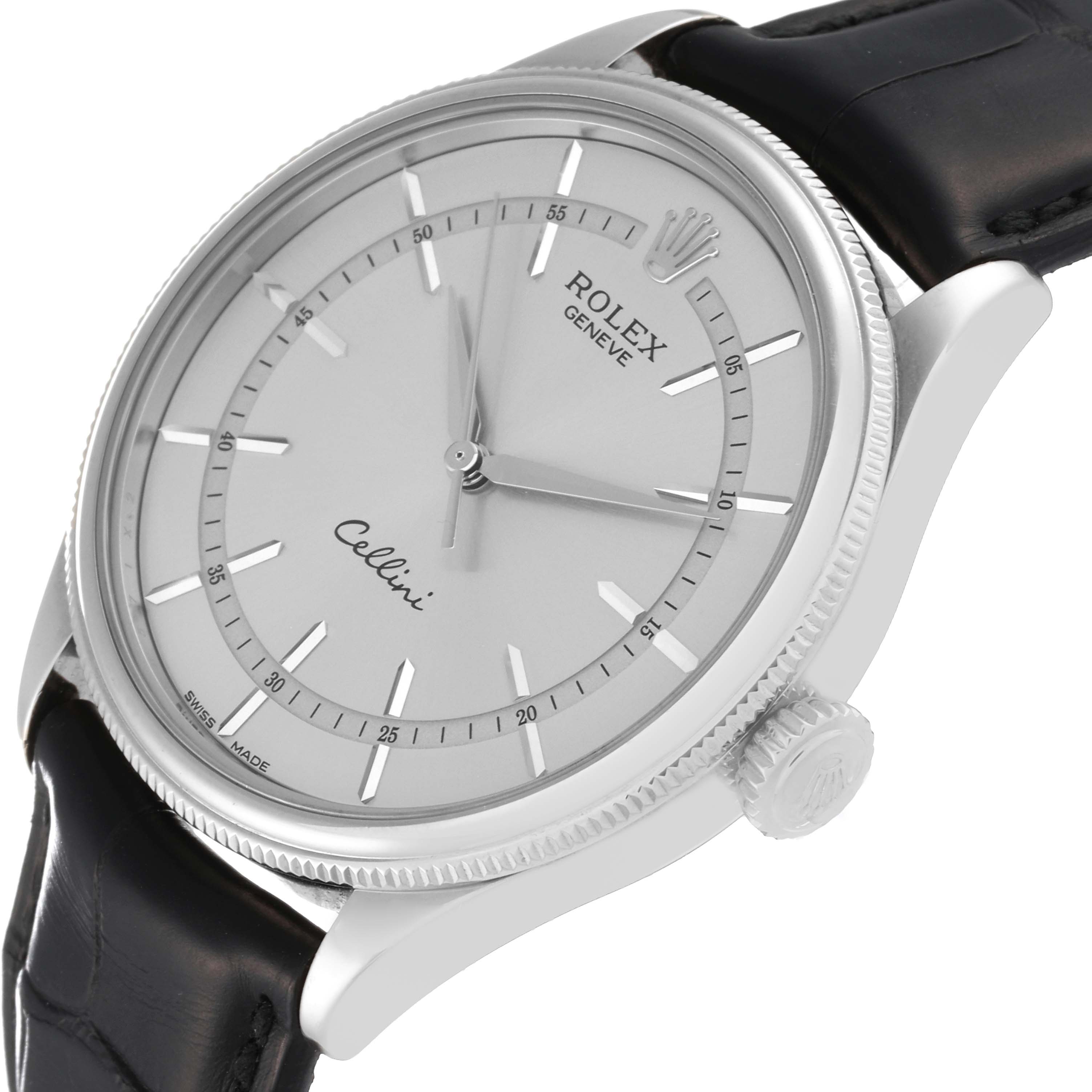 The Rolex Cellini 50509 Men's White Gold Silver Dial 50509 Men's White Gold Silver Dial watch is shown from an angle displaying the face, bezel, crown, and part of the leather strap.