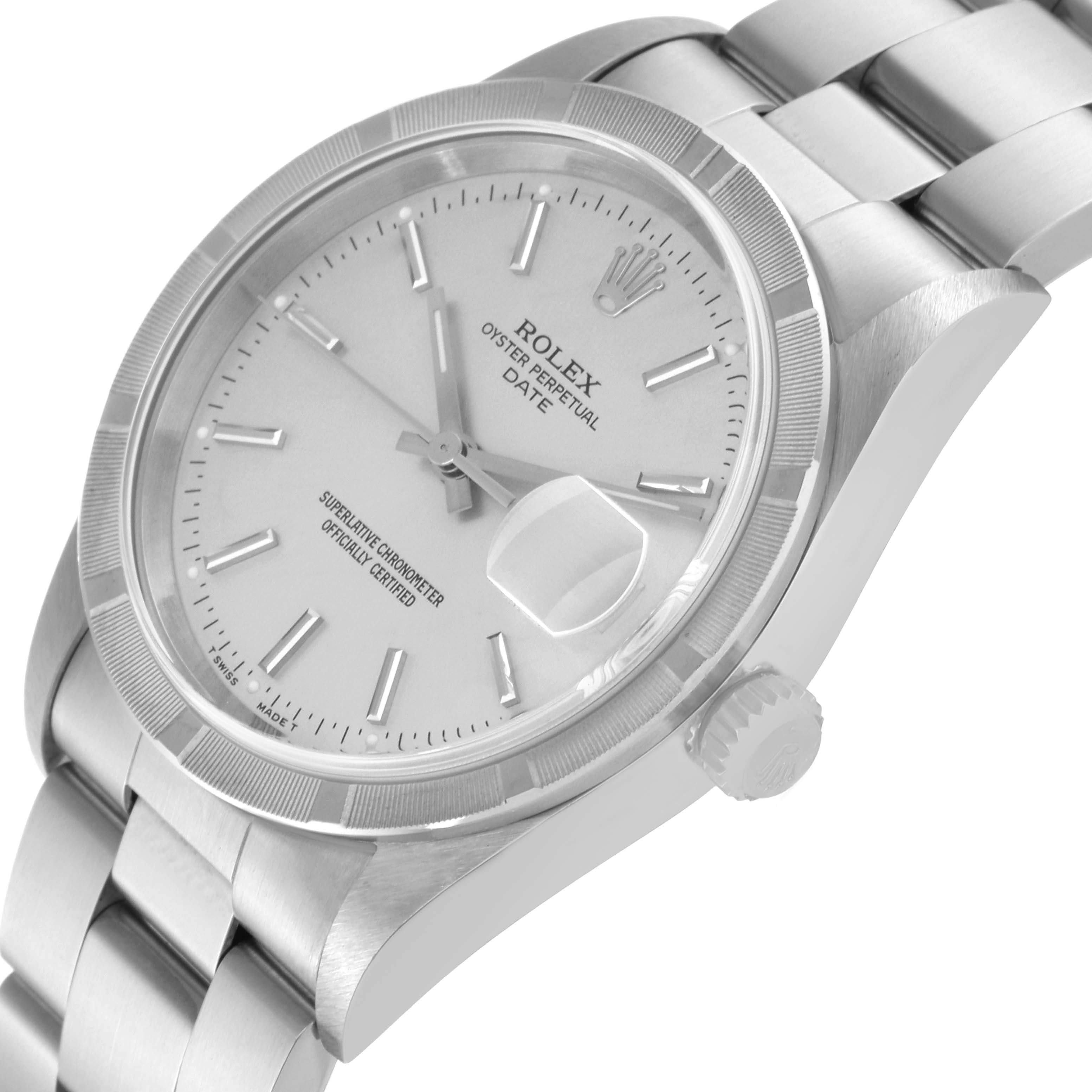This image shows a close-up, angled view of the Rolex Date 15210 Men's Stainless Steel Silver Dial 15210 Men's Stainless Steel Silver Dial model watch, focusing on the face, bezel, and part of the metal bracelet.