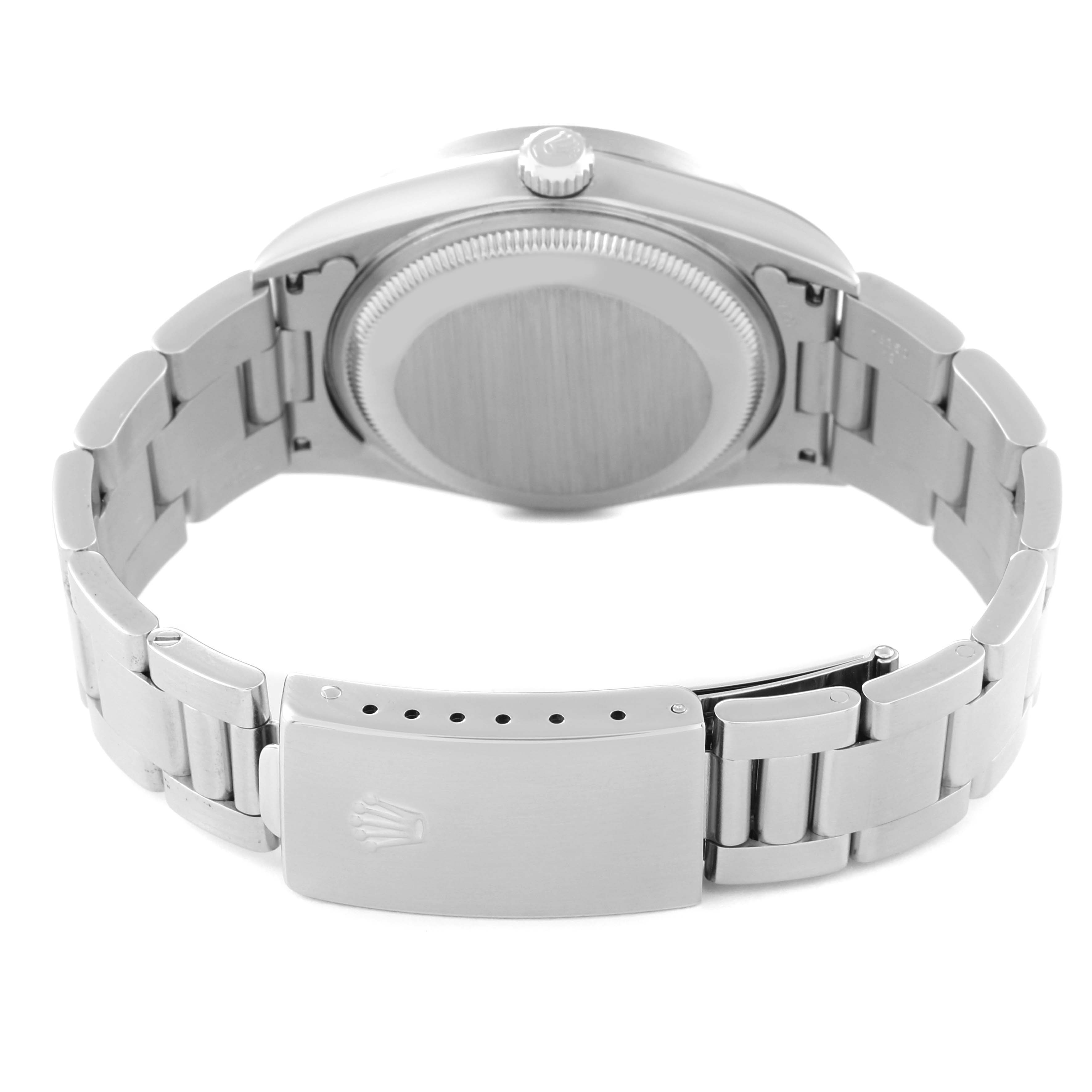 This image shows the back case, crown, and clasp of the Rolex Date 15210 Men's Stainless Steel White Dial 15210 Men's Stainless Steel White Dial model watch.