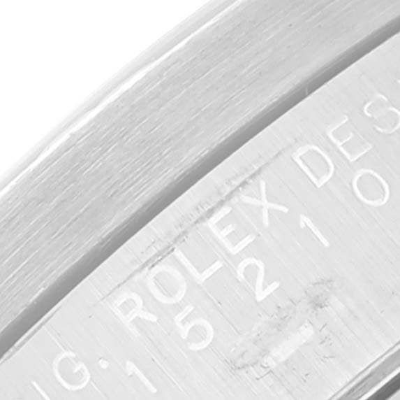 This close-up image shows the side of the Rolex Date 15210 Men's Stainless Steel White Dial 15210 Men's Stainless Steel White Dial model, focusing on the detailed engraving.