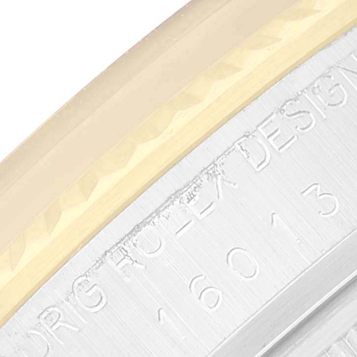 This close-up image shows the edge of the case and the engraved serial number of the Vintage Collection model by Rolex.